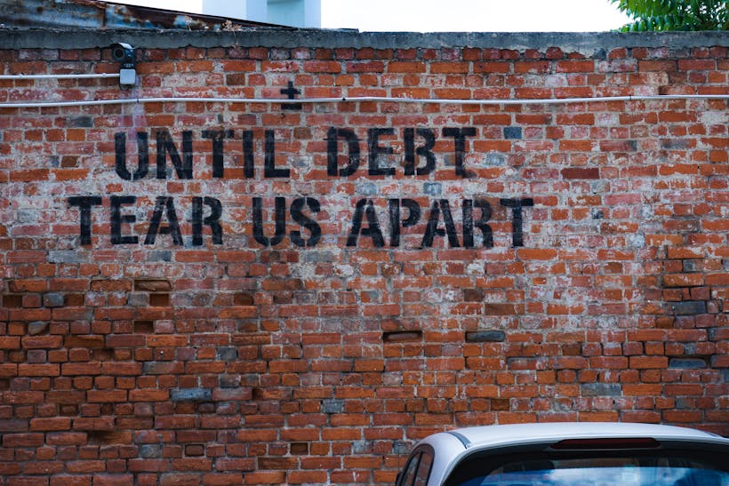 Until Debt Tear Us Apart Graffiti