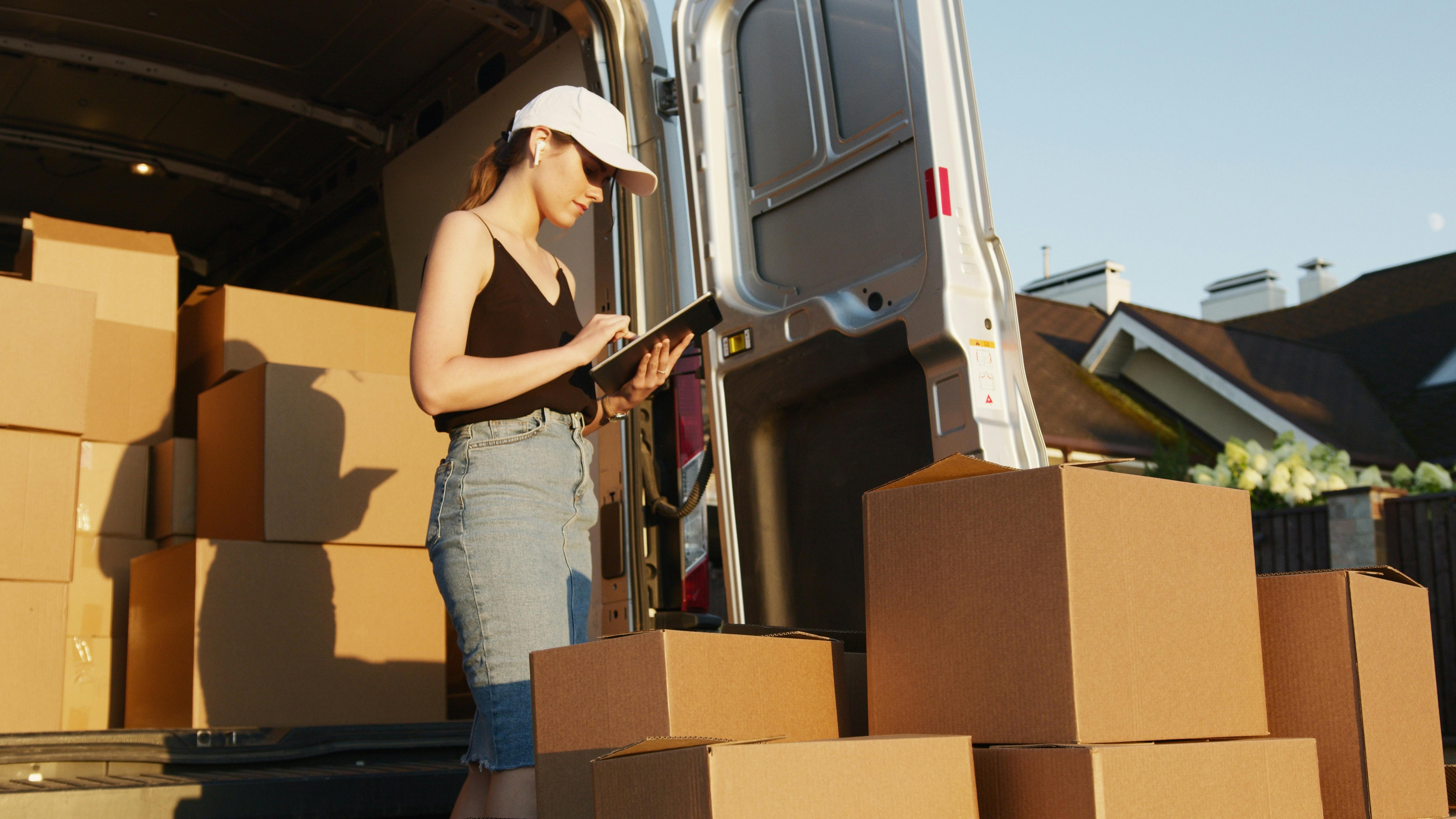 Woman Packing Boxes