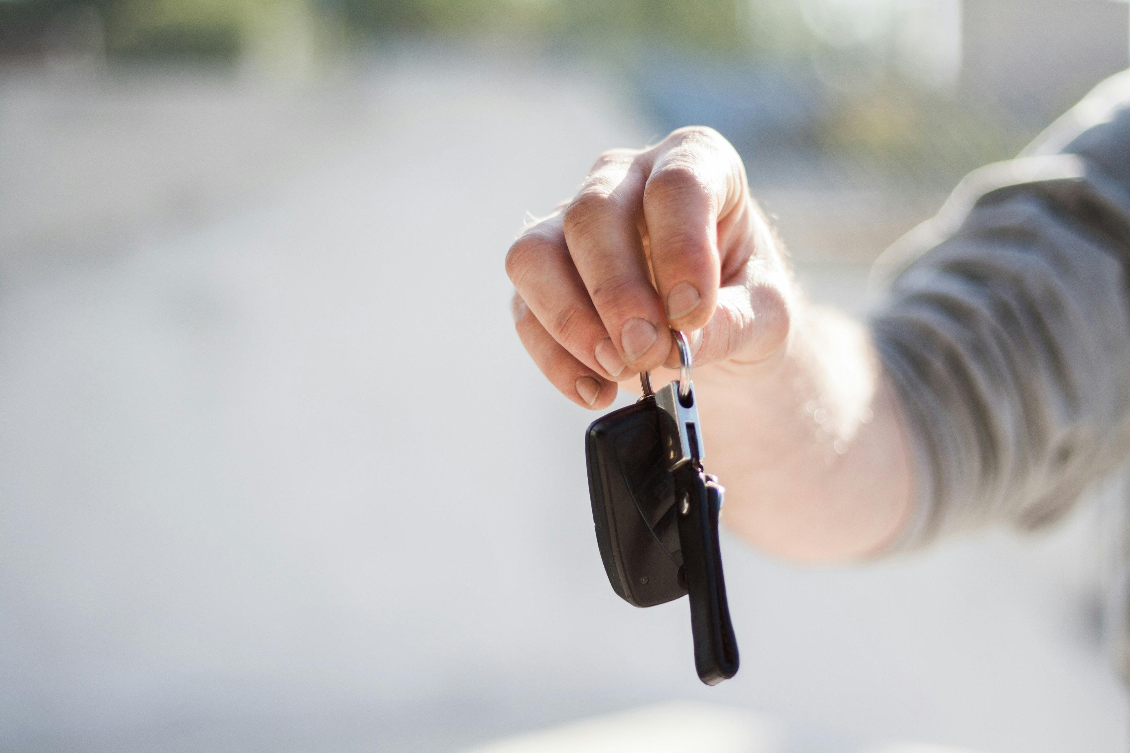 Hand with car keys