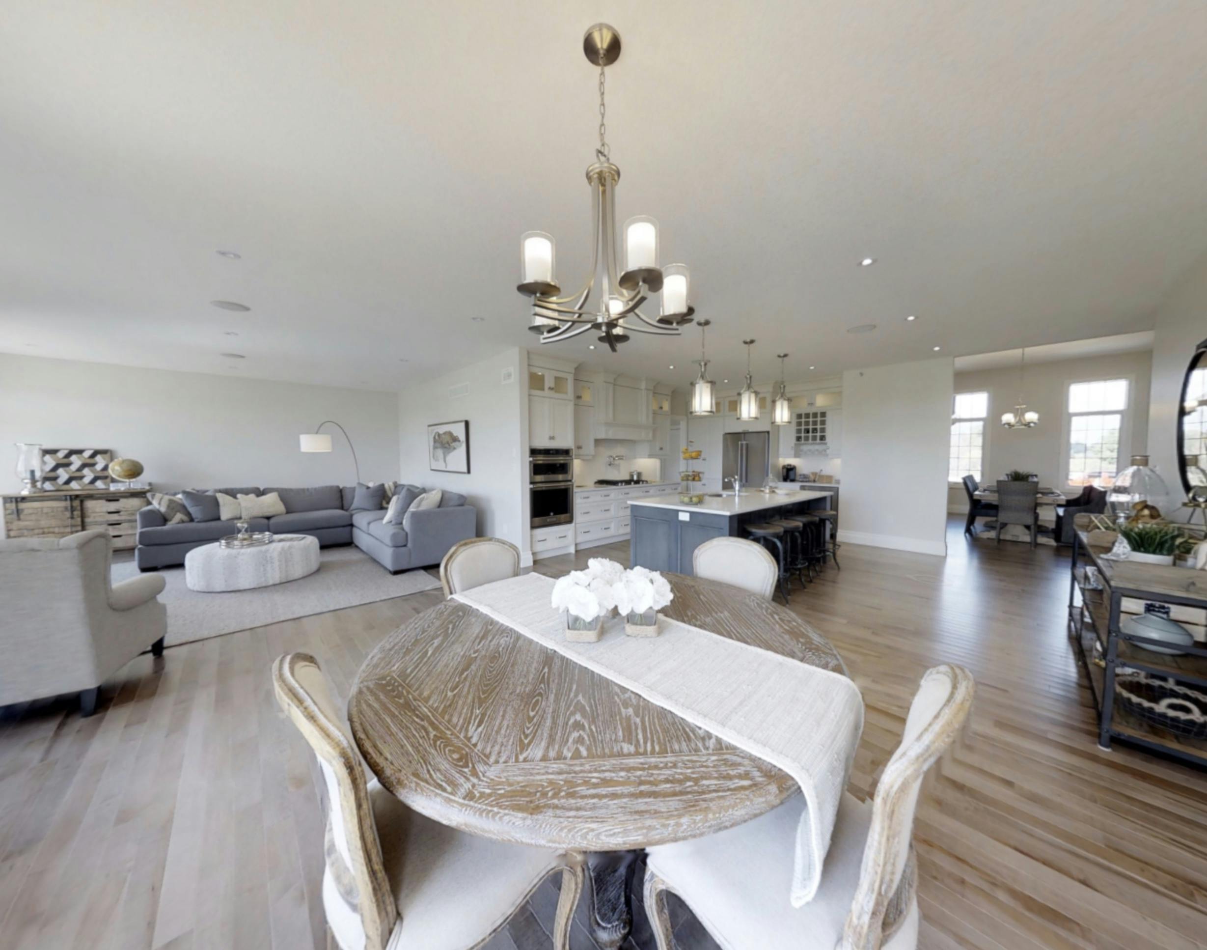 Pinestone Home Interior - Wide view of kitchen with eating space