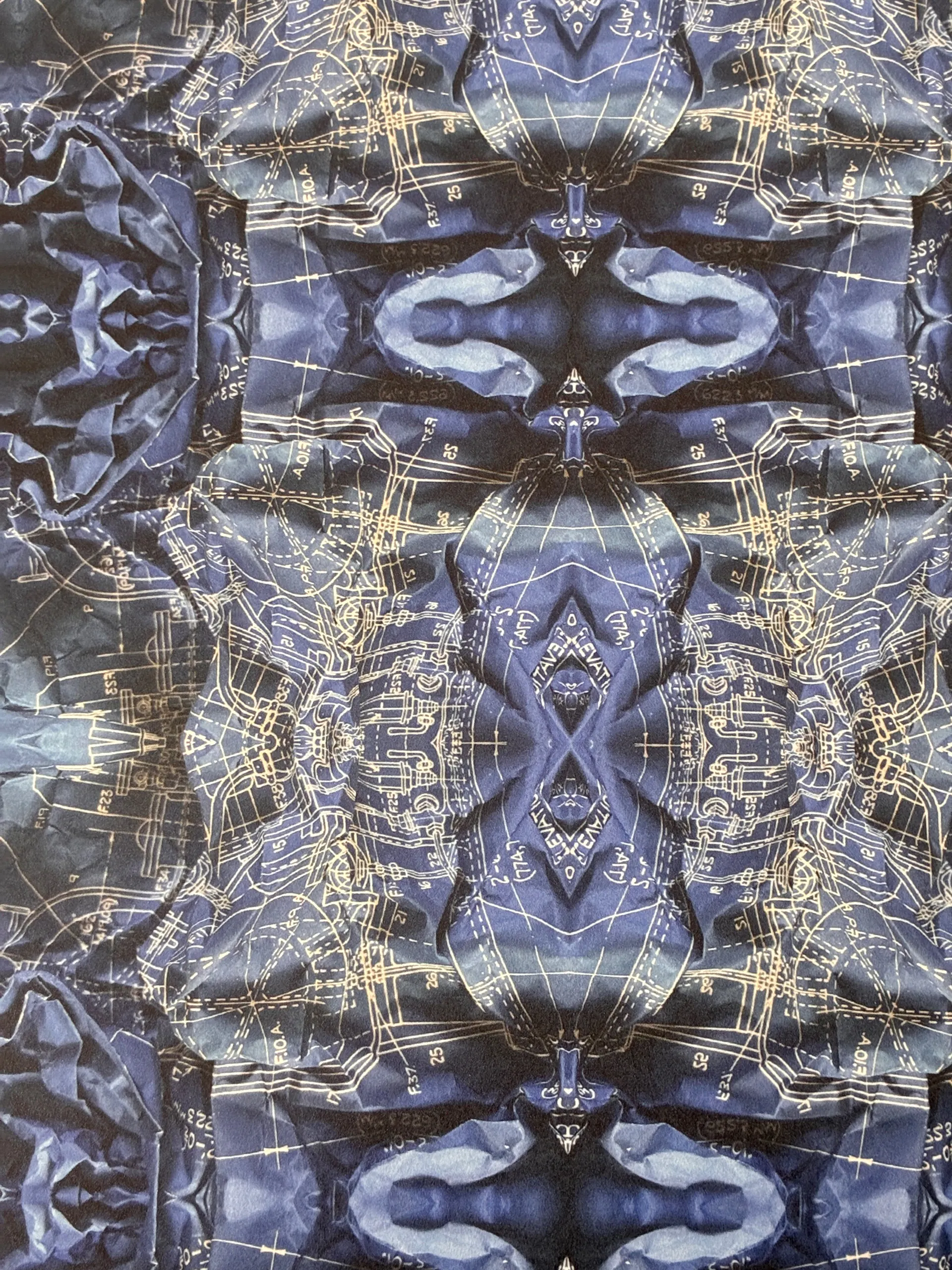 Mirrored blueprint linework repeating across printed cloth