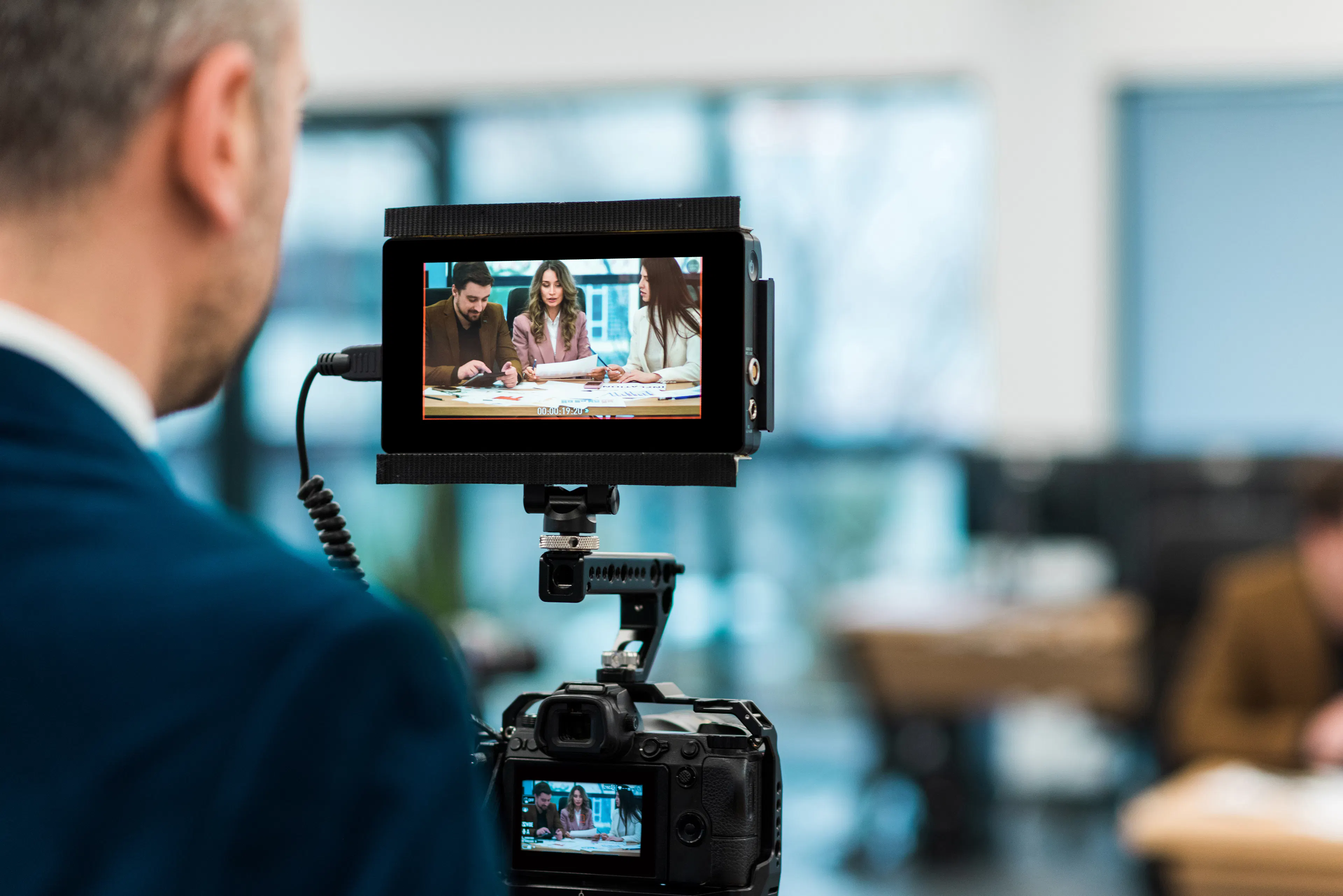 professional-photographer-shooting-business-meeting-office