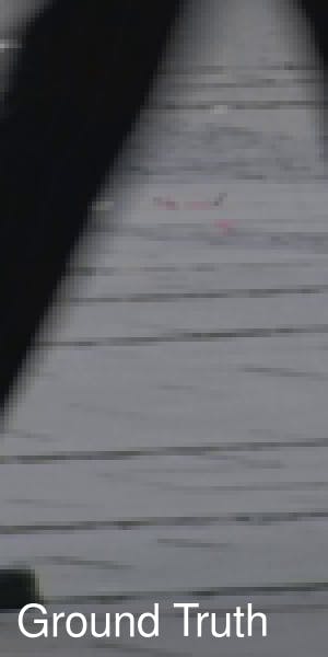 Image of body of water seen through slats