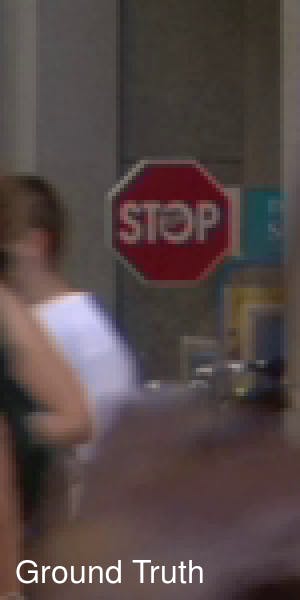 Pedestrians in front of a stop sign 