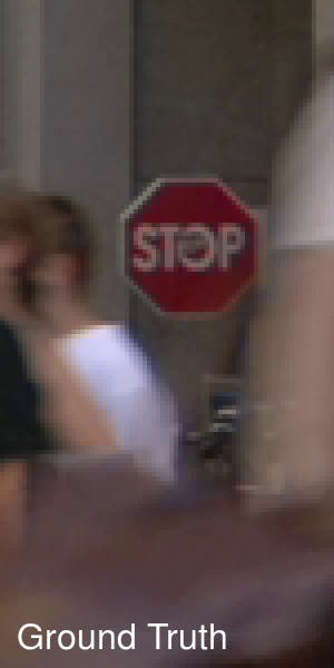 Pedestrians in front of a stop sign 