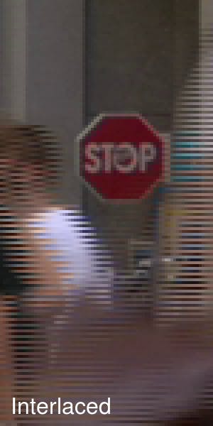 Pedestrians in front of a stop sign