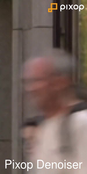 Blurry picture of man walking in the street