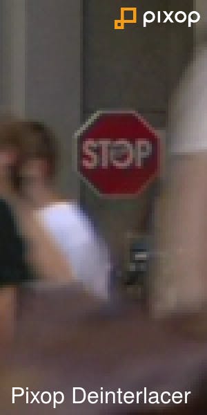 Pedestrians in front of a stop sign 