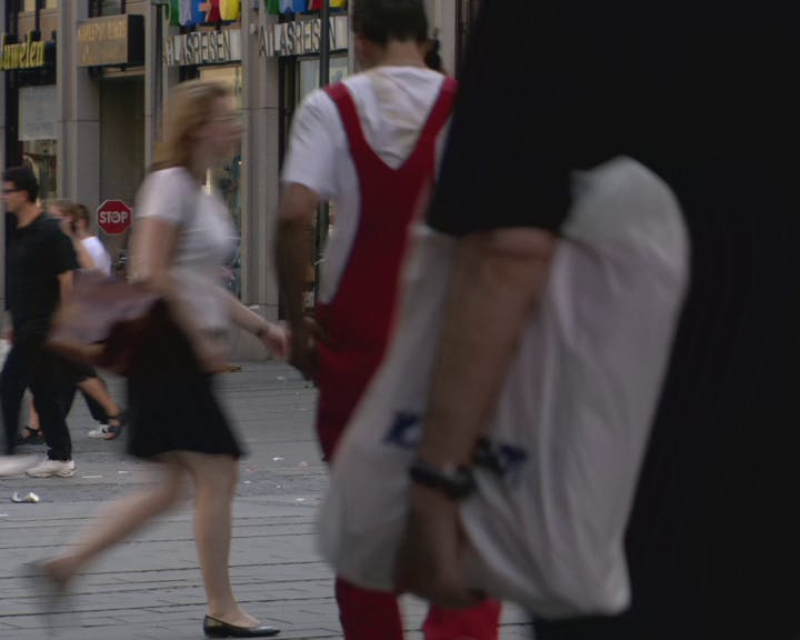 Pedestrians walking in the street. 