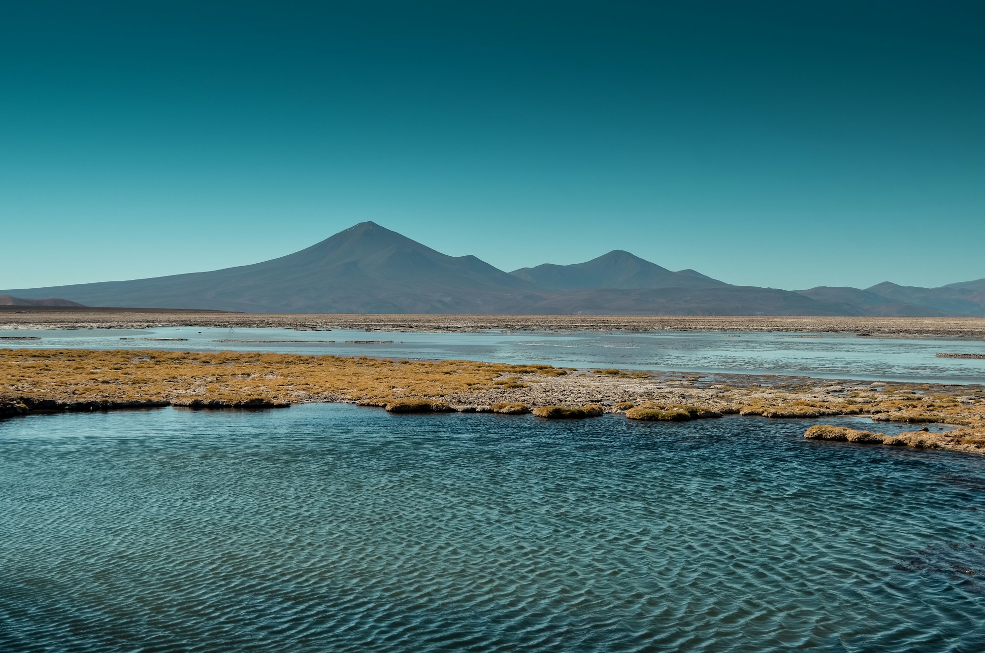 brown mountain under blue sky during daytime