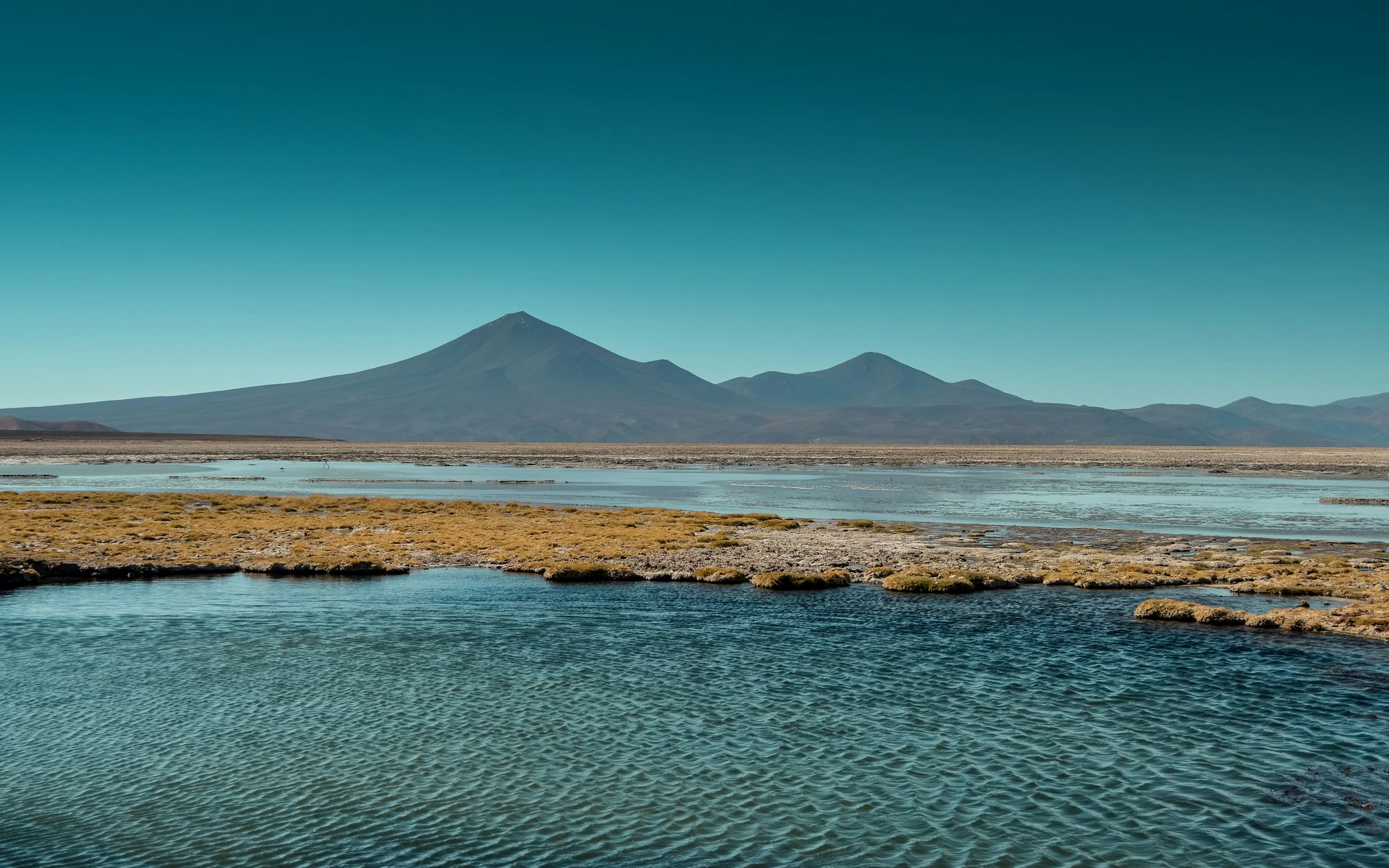 brown mountain under blue sky during daytime