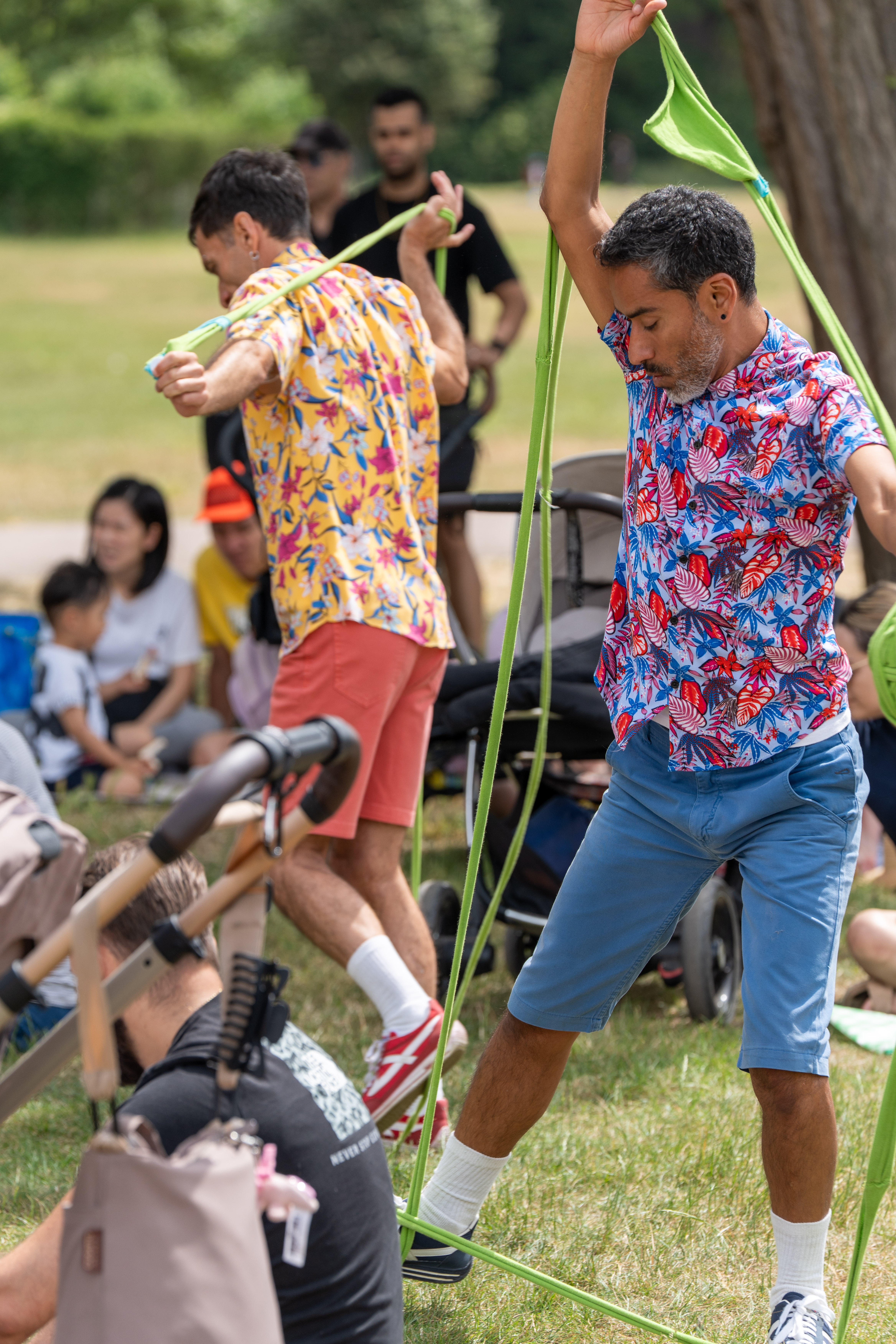 Two artists outdoors during a performance of Tangle 