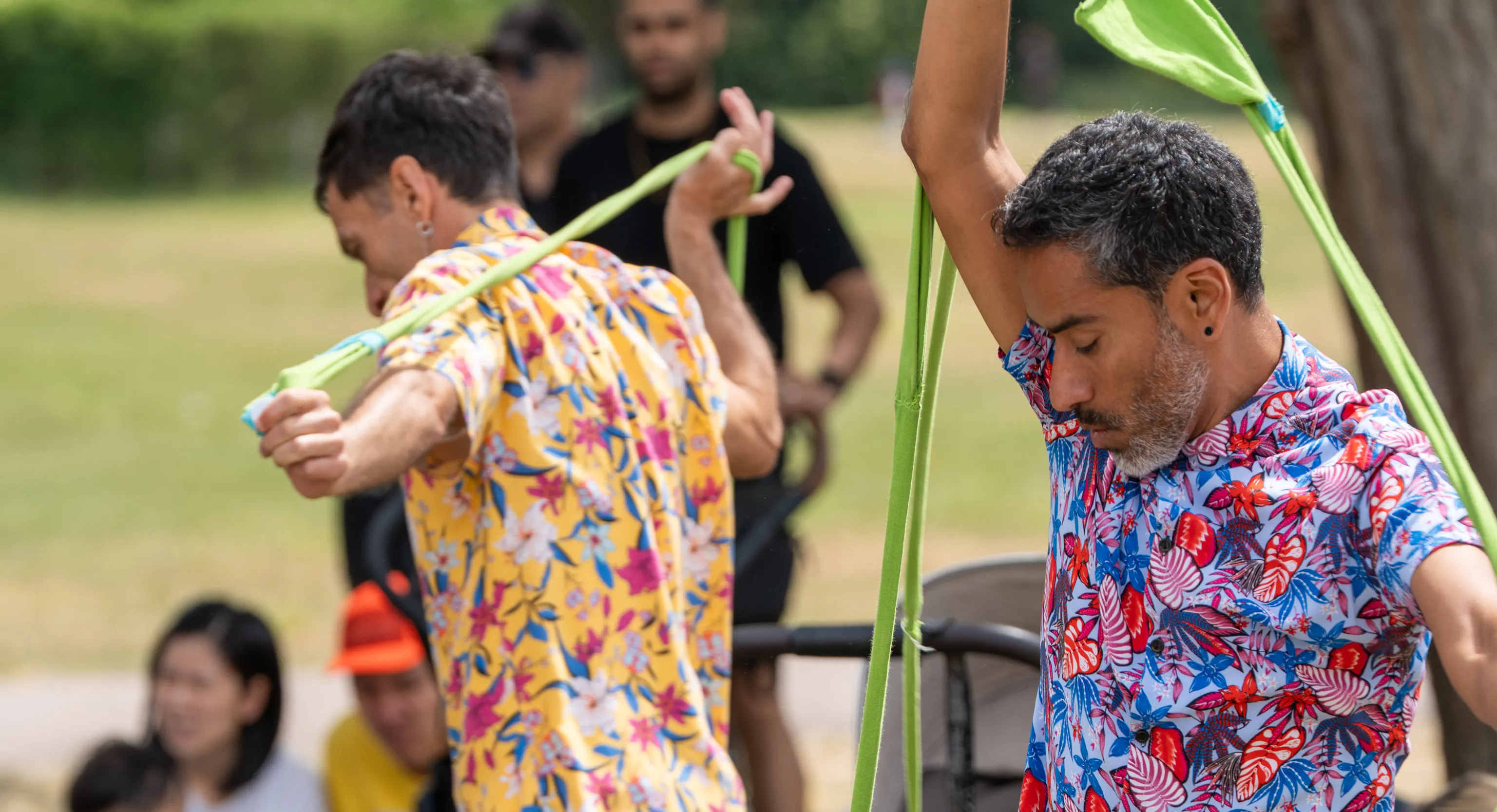 Two artists outdoors during a performance of Tangle