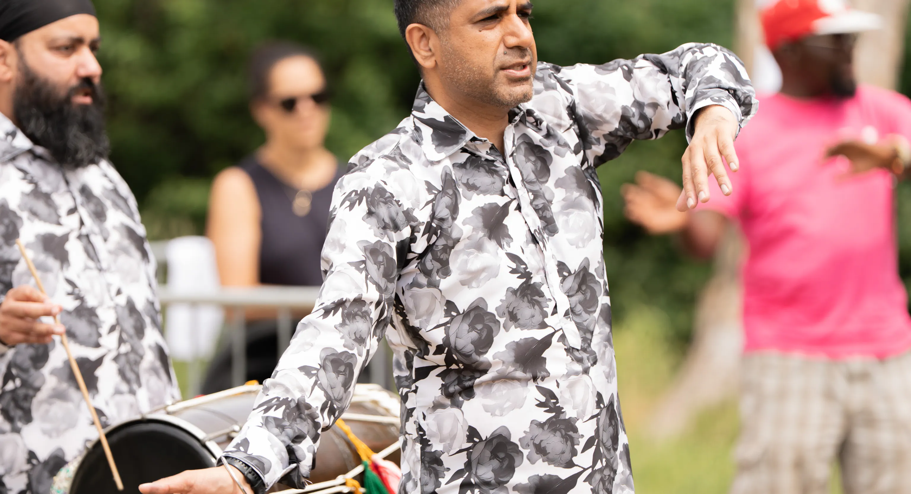 Two performers from Cohesion Plus during a performance of Baby Bhangra