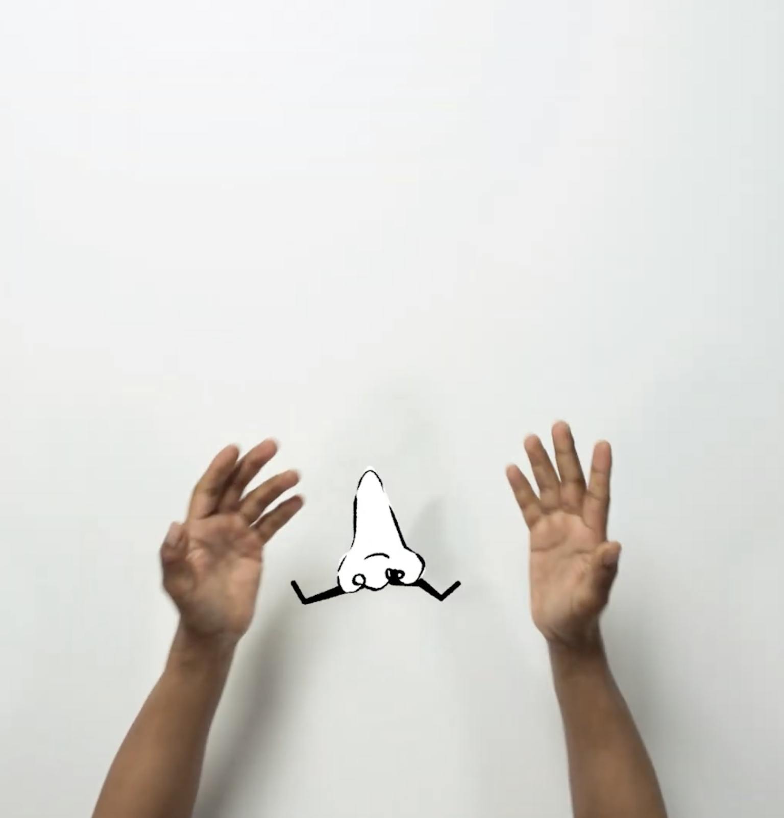 Two hands on a white background with an animated nose in the middle