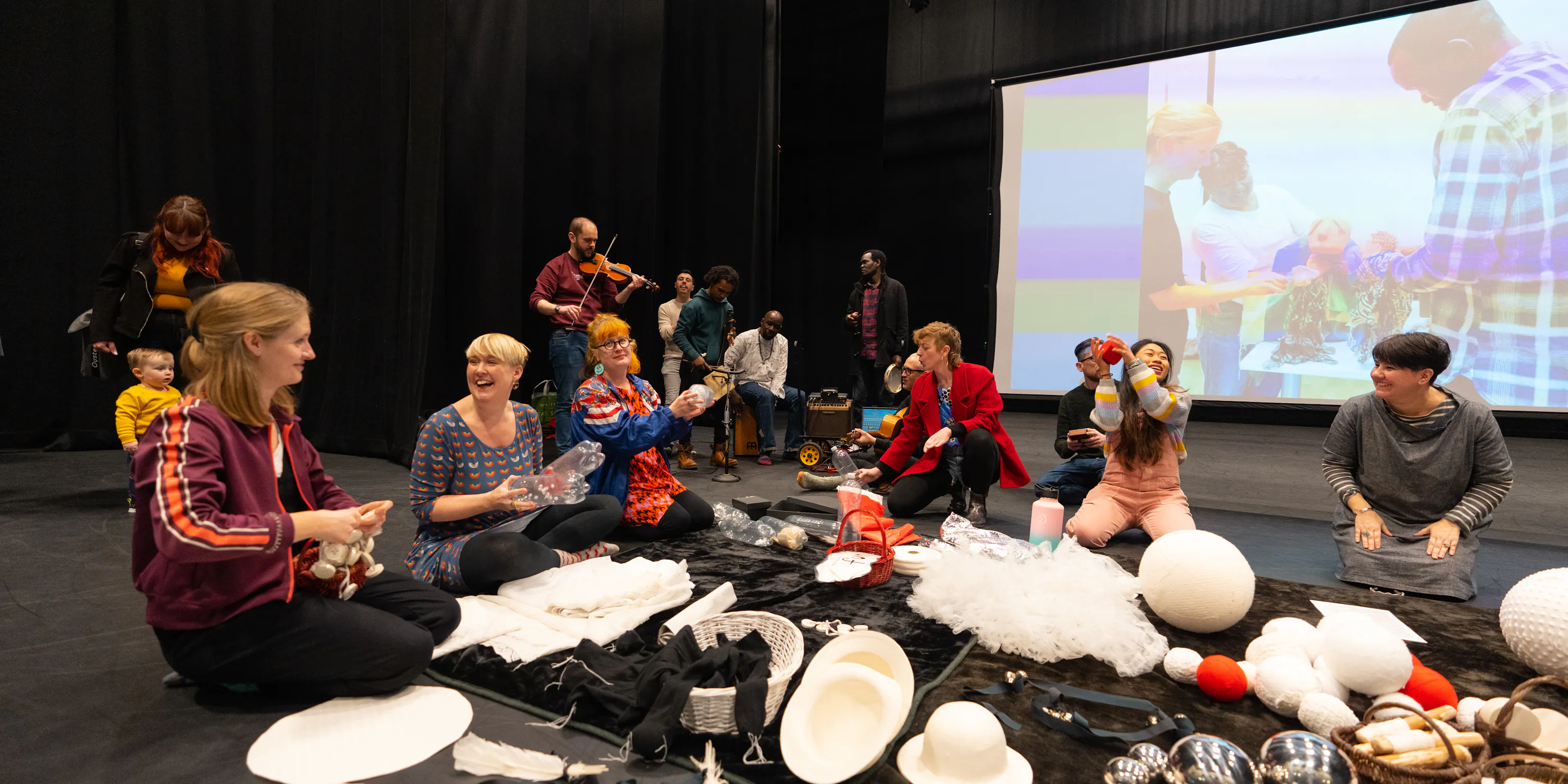 Playground artists making music and interacting with each other