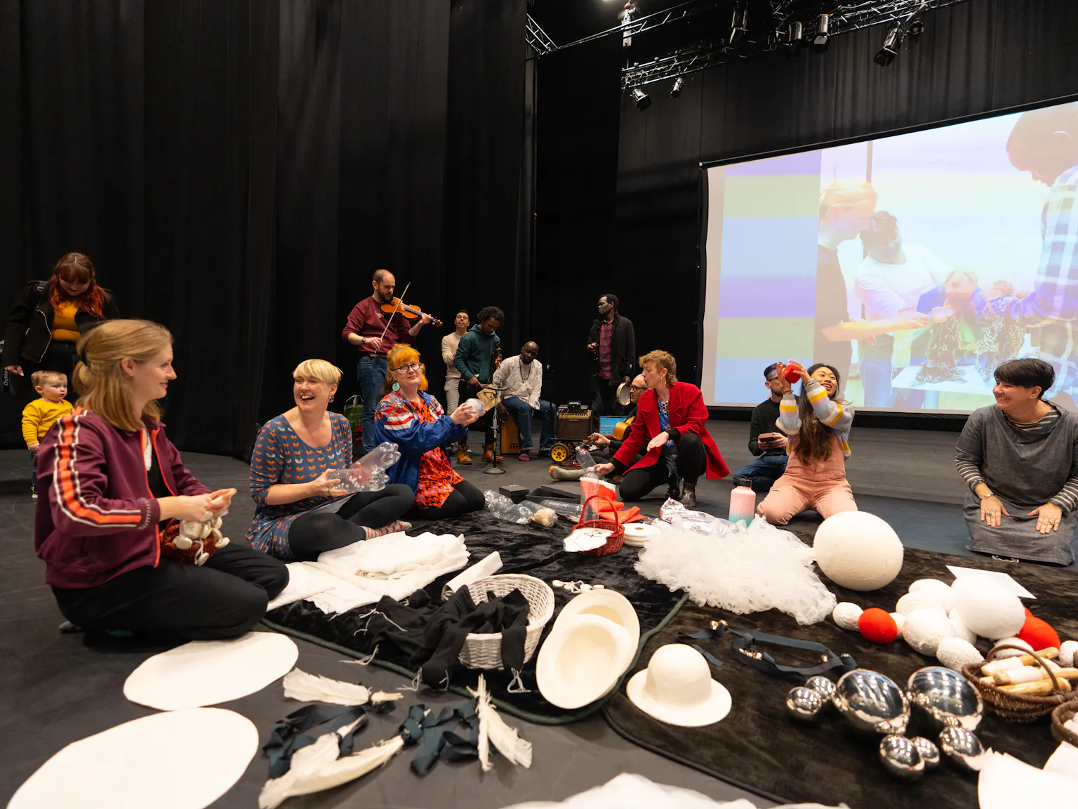 Playground artists making music and interacting with each other
