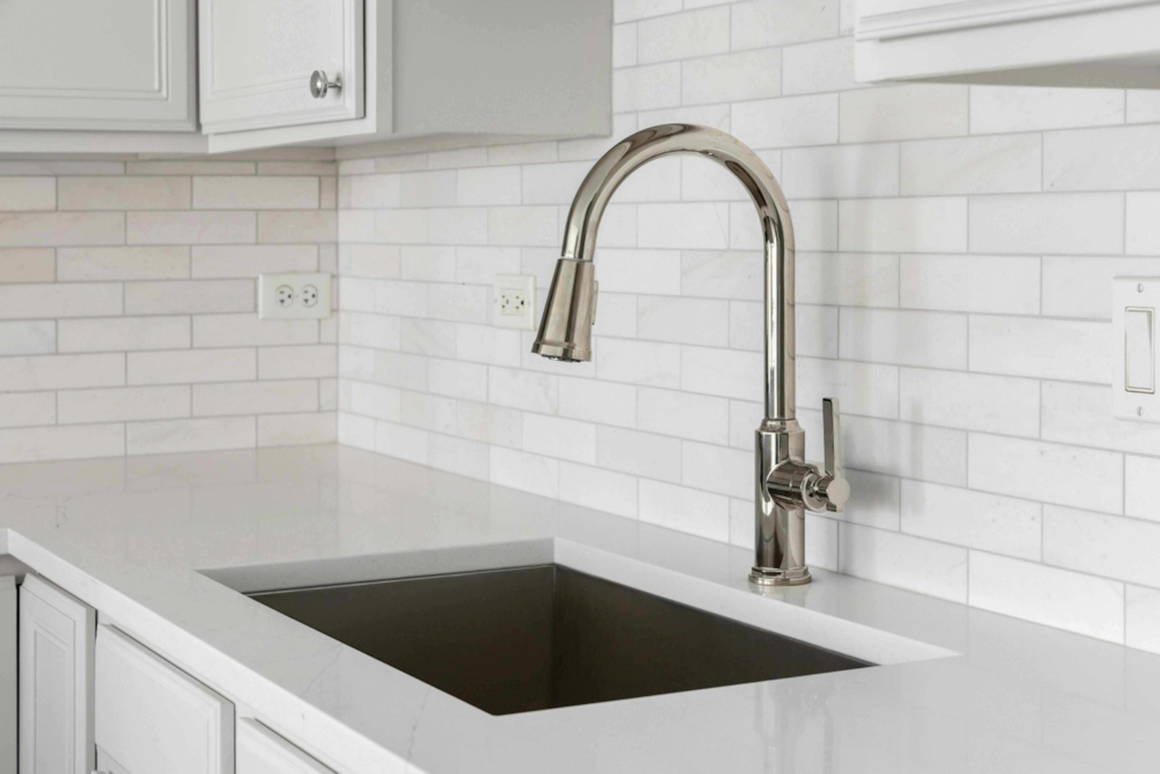 Install Kitchen Sink Plumber London