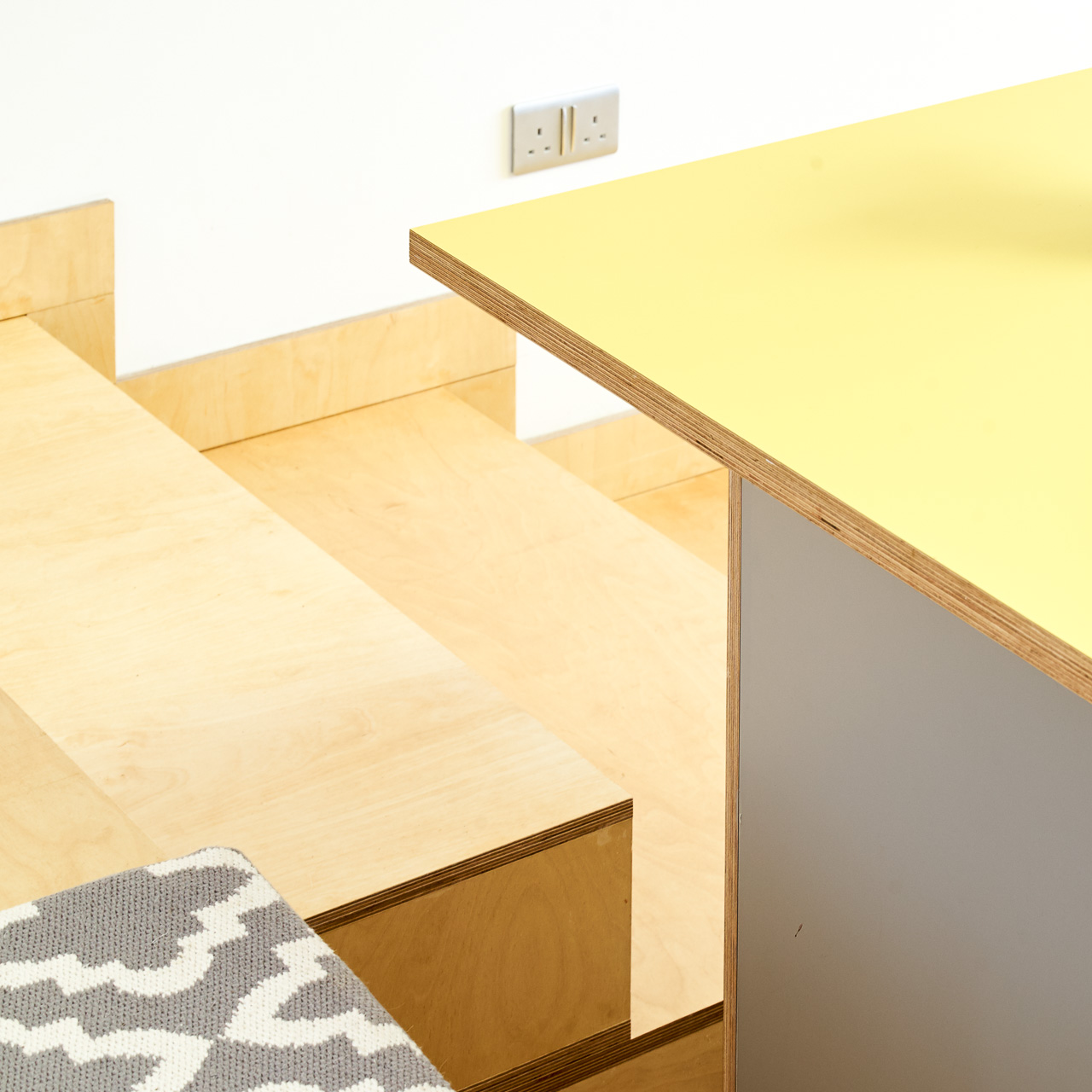 Fog and Chrome Yellow Formica fronts with semi-recessed handles in our Orchard Way kitchen