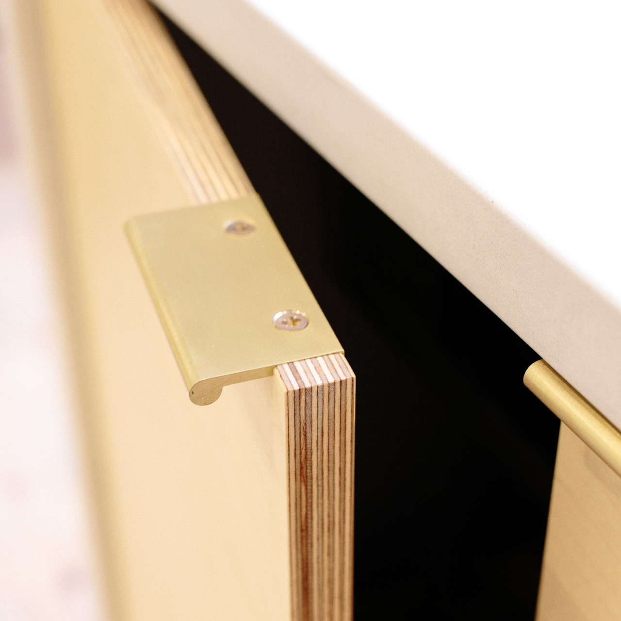 Birch plywood fronts and brass edge pull handles in our Hurst Road kitchen