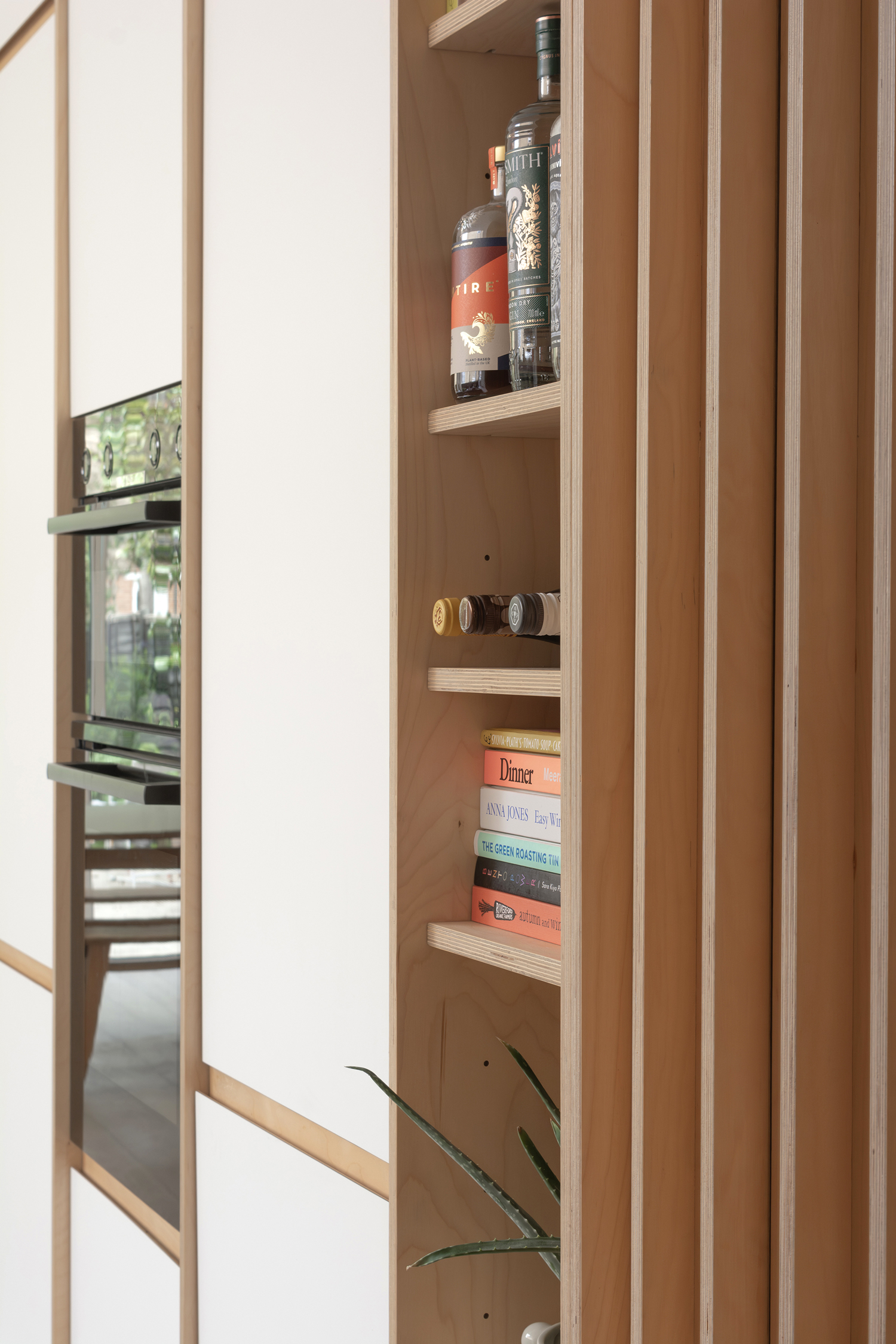 Plykea Fenix faced birch plywood kitchen with adjacent stair guard