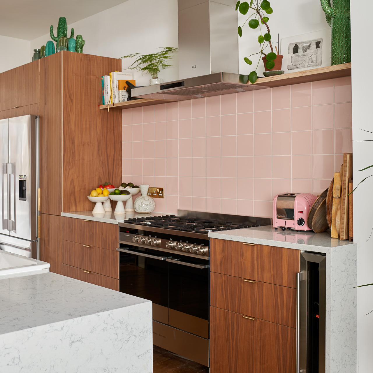 Hunter Green Formica, Walnut ply and brass edge pulls in our Forest Drive kitchen
