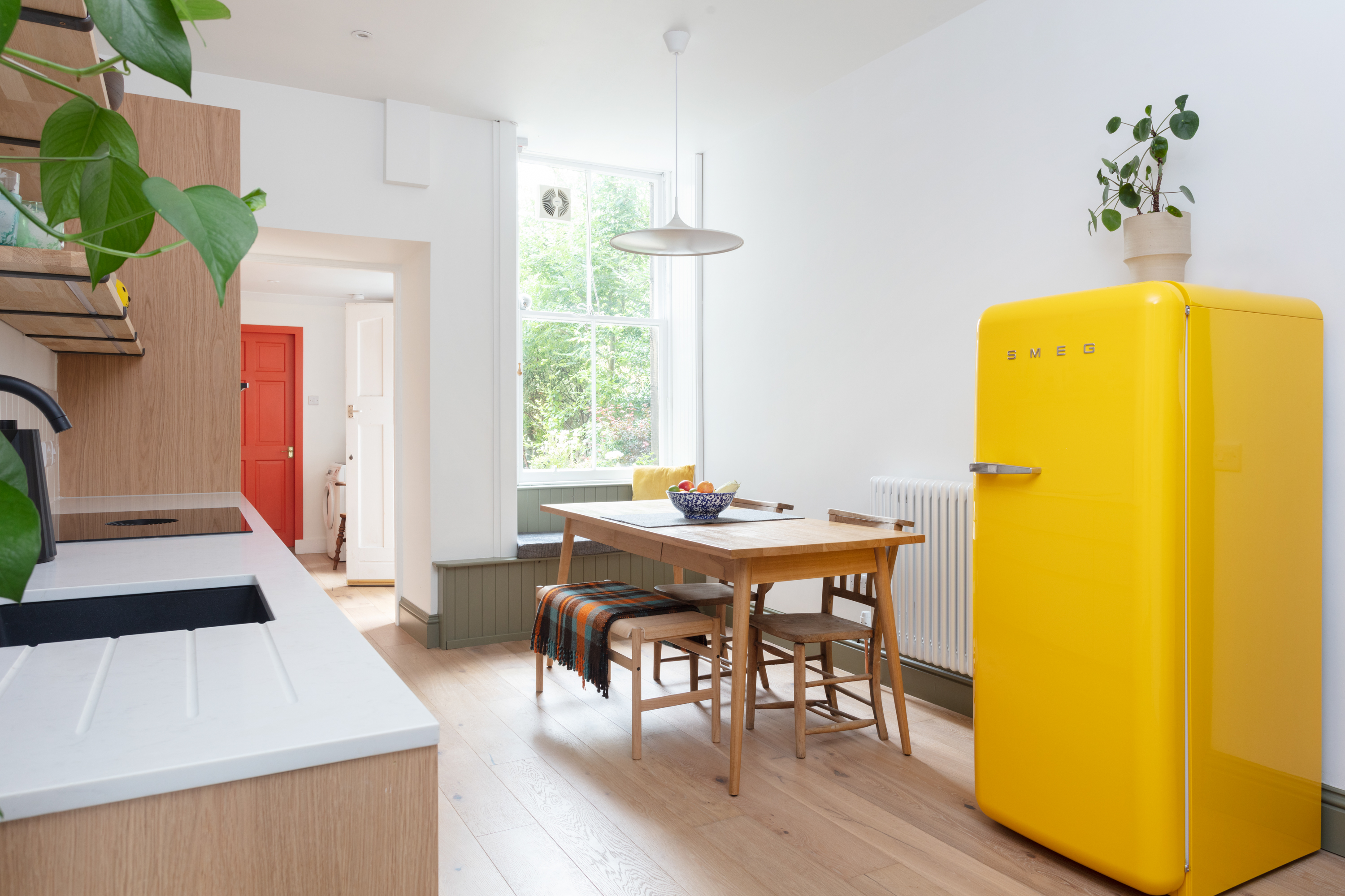 Plykea kitchen fronts and a yellow Smeg fridge