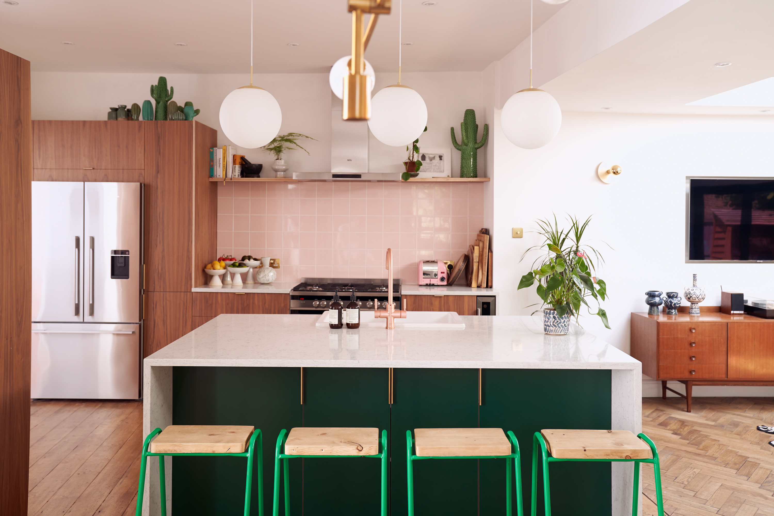 Hunter Green Formica, Walnut ply and brass edge pulls in our Forest Drive kitchen