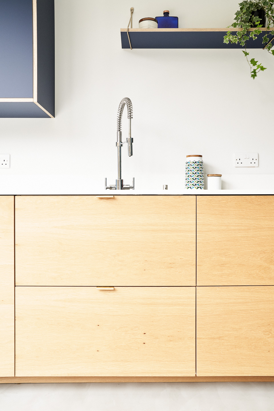 Blu Fez Fenix and Oak are combined with brass edge pull handles in our Ondine Road kitchen