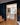 A view from the living area through to the kitchen. Plykea Formica Terril kitchen fronts with birch ply spacers and a semi-recessed birch grab handle