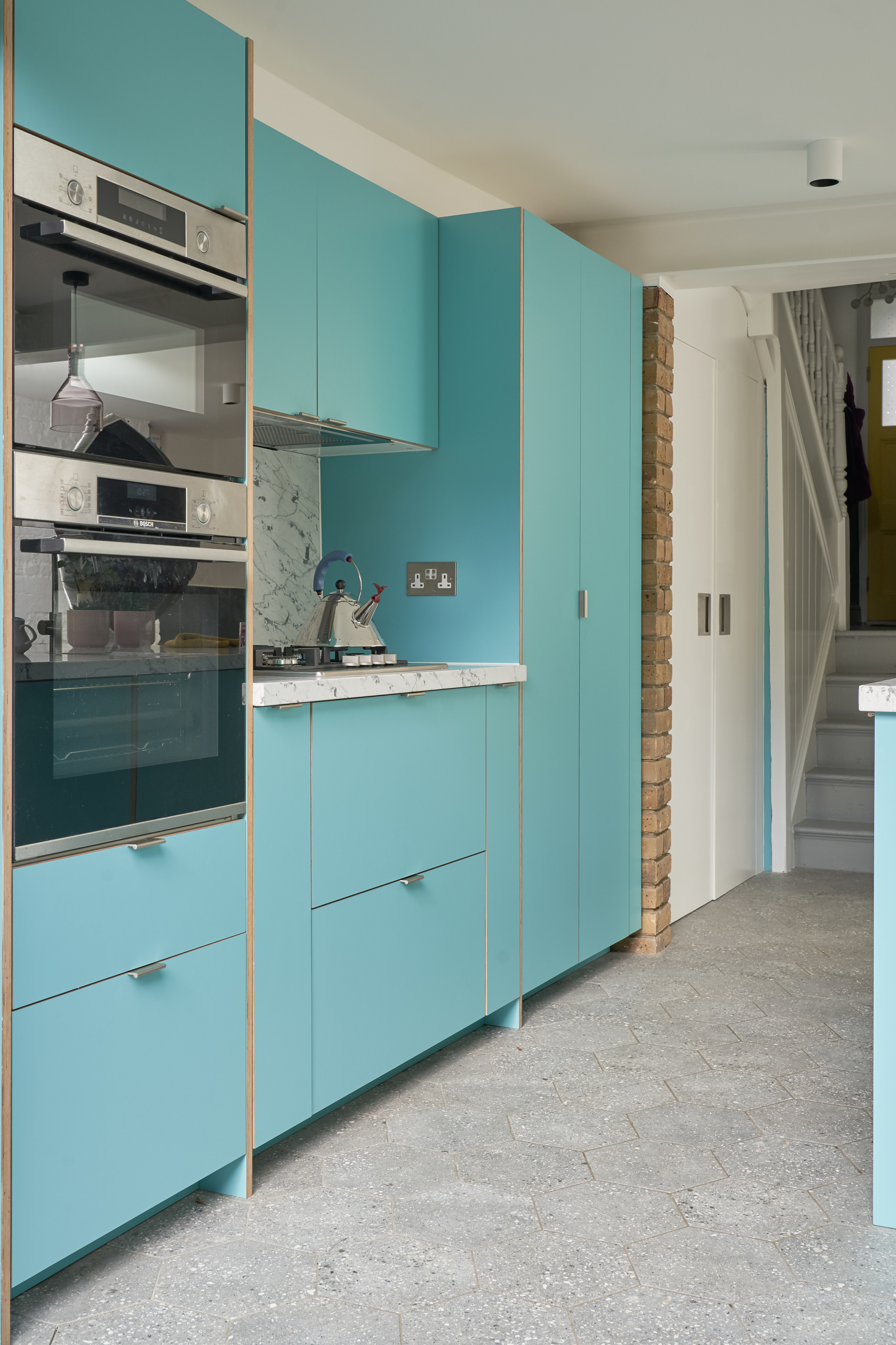 Plykea Formica Maui fronts with satin nickel edge pull handles