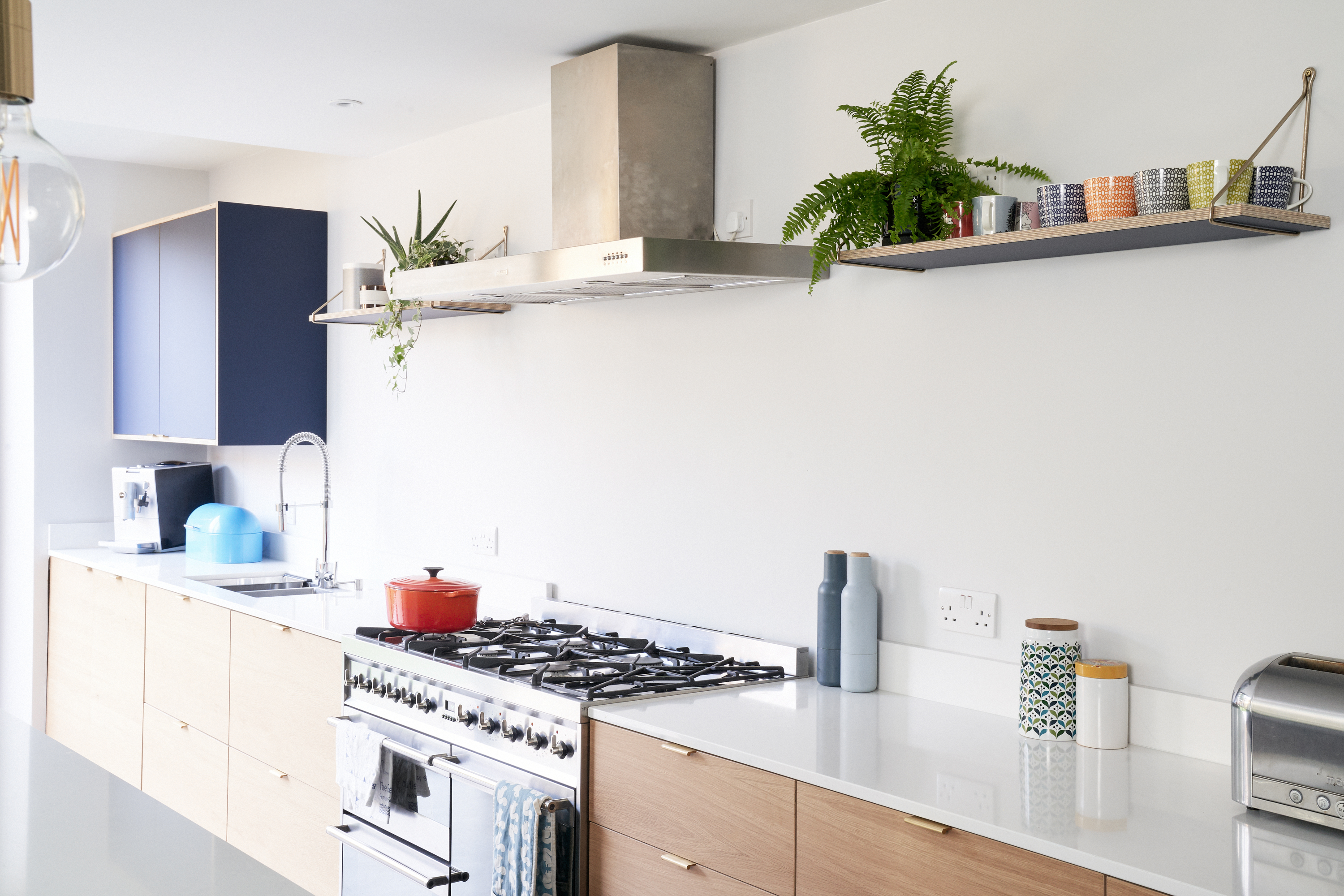 Blu Fez Fenix and Oak are combined with brass edge pull handles in our Ondine Road kitchen