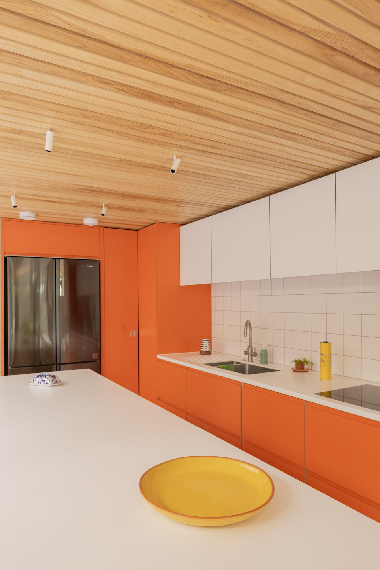 Plykea Formica Clementine with Arpa Bianco Nube wall units 