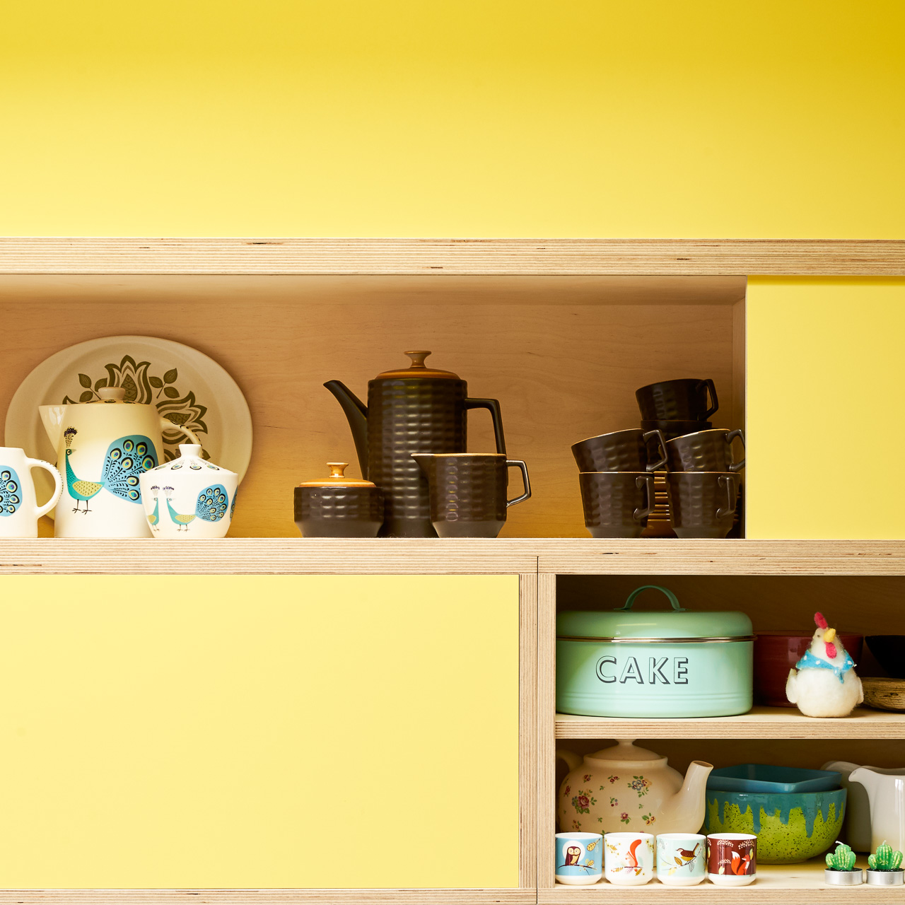 Fog and Chrome Yellow Formica fronts with semi-recessed handles in our Orchard Way kitchen