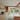 Plykea wood veneer and Formica plywood fronts with brass edge pull handles