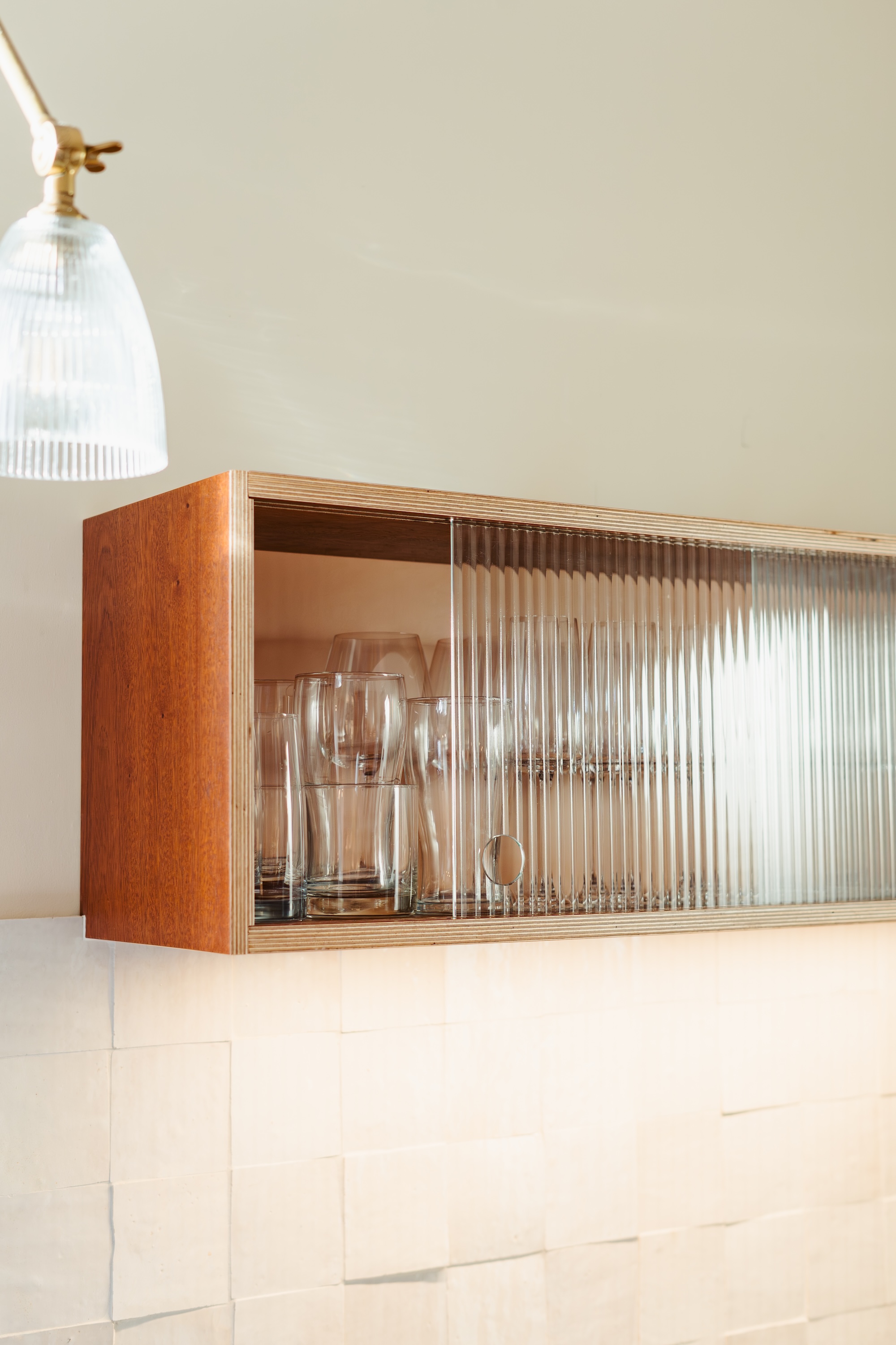 Plykea sapele veneered birch plywood and reeded glass Urtil shelf unit