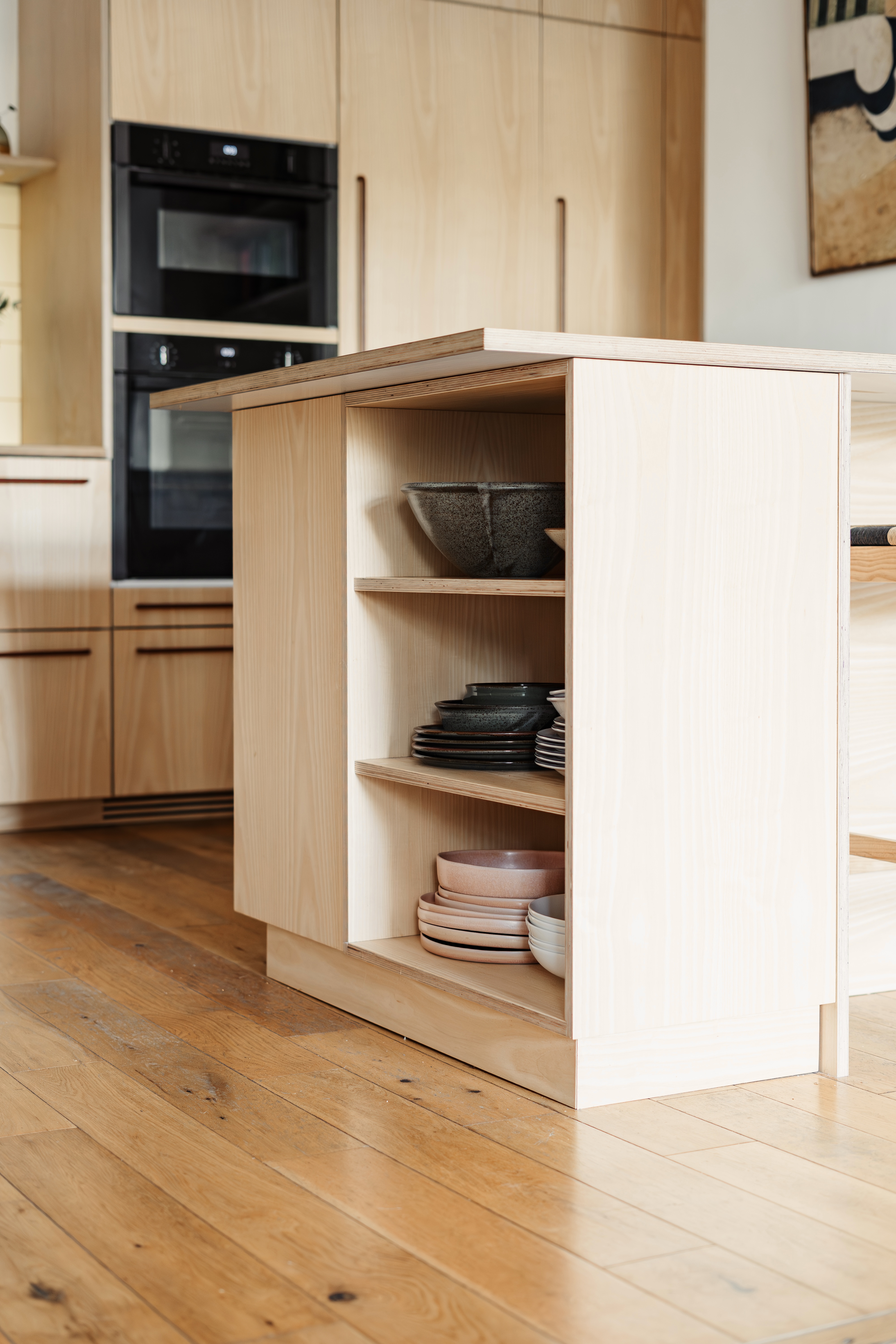 Plykea ash veneered birch plywood fronts with an island Urtil unit