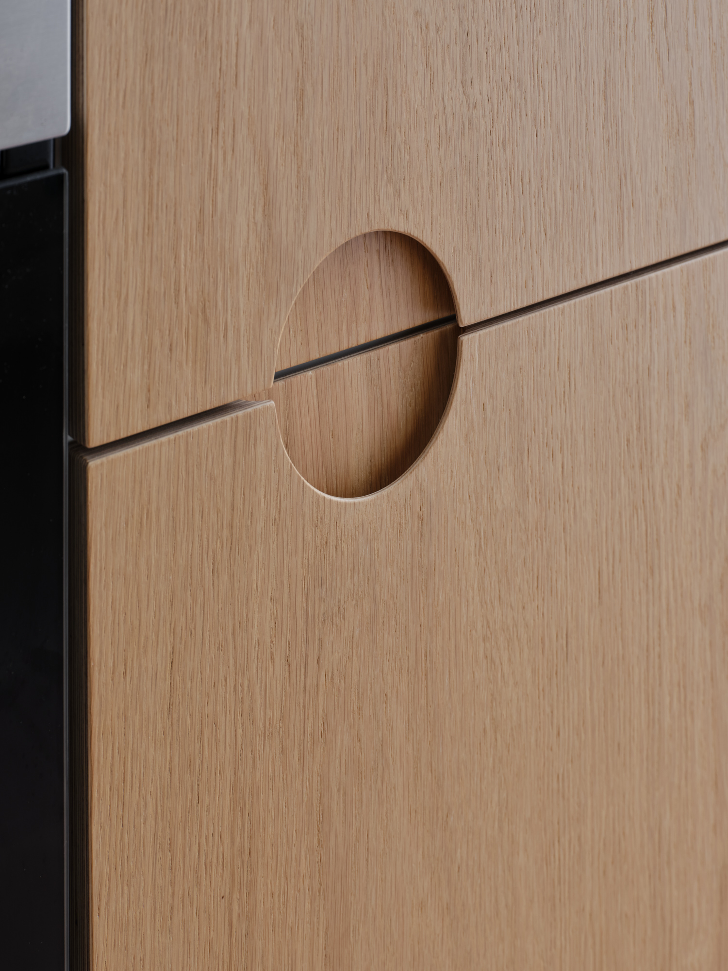 Plykea oak-veneered birch plywood kitchen fronts with half-arc handles