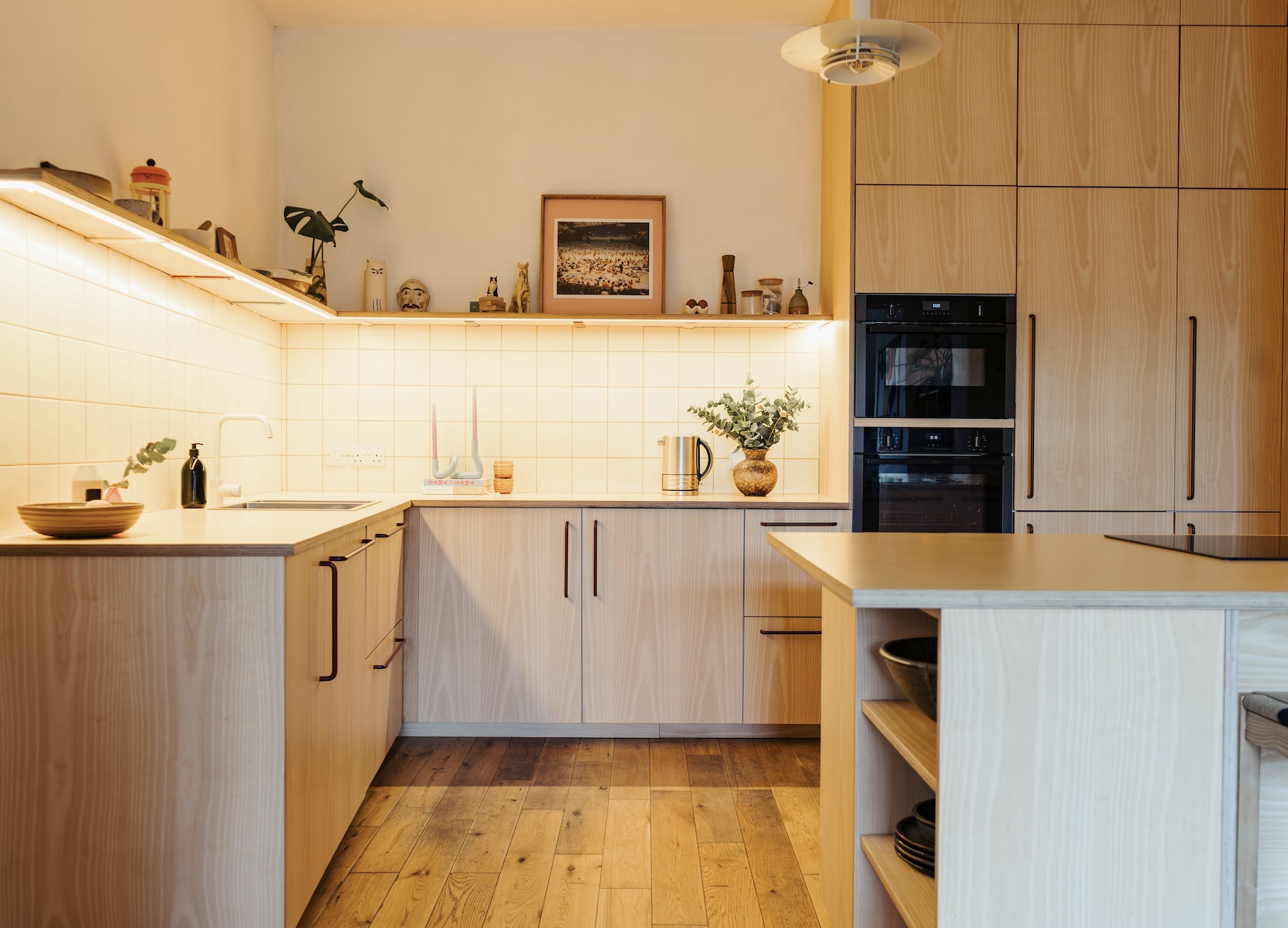 Plykea ash veneered birch plywood fronts with Swarf handles and yellow Formica Tenere worktop
