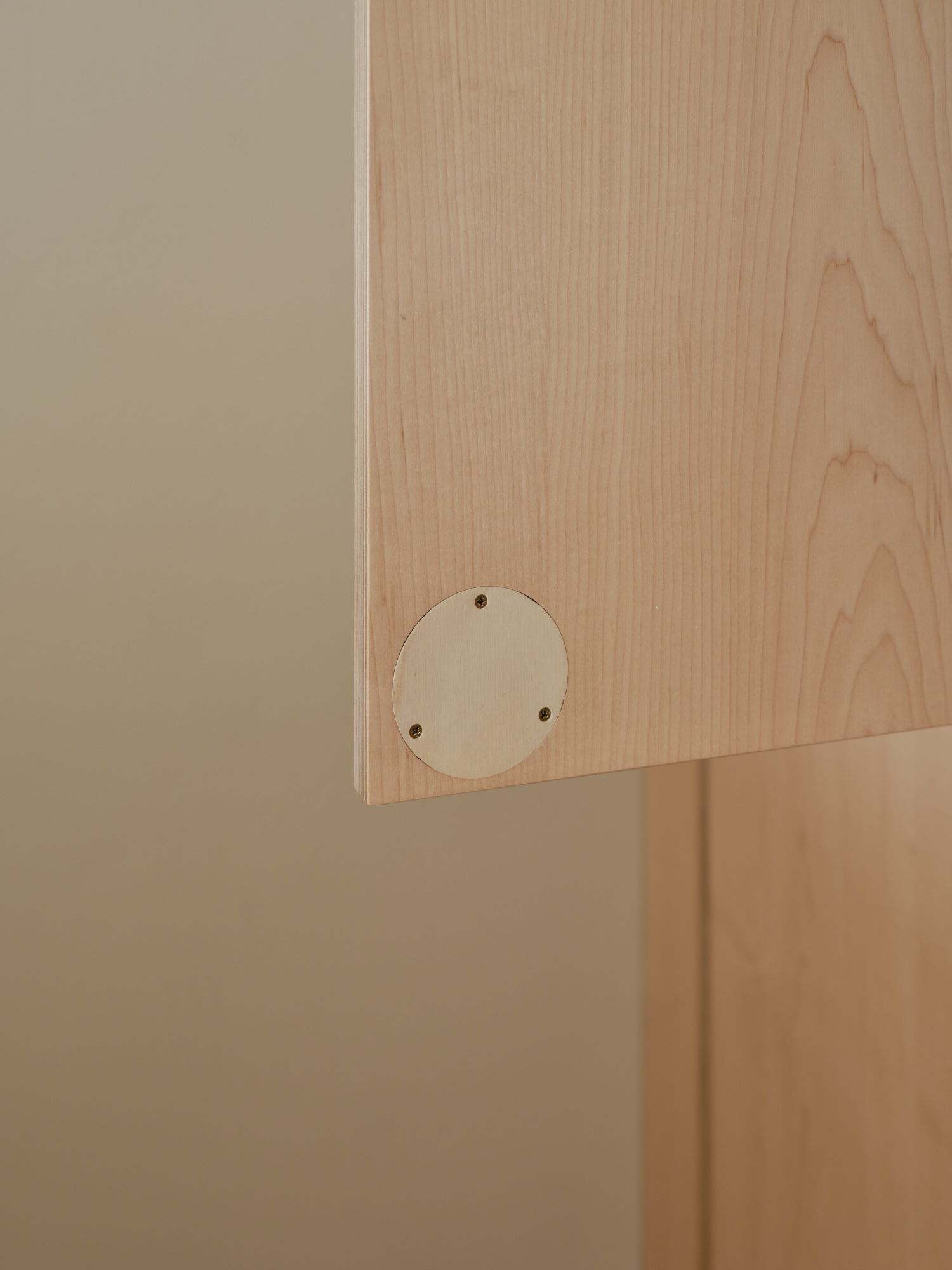 Plykea maple-veneered birch plywood + small circular handles 