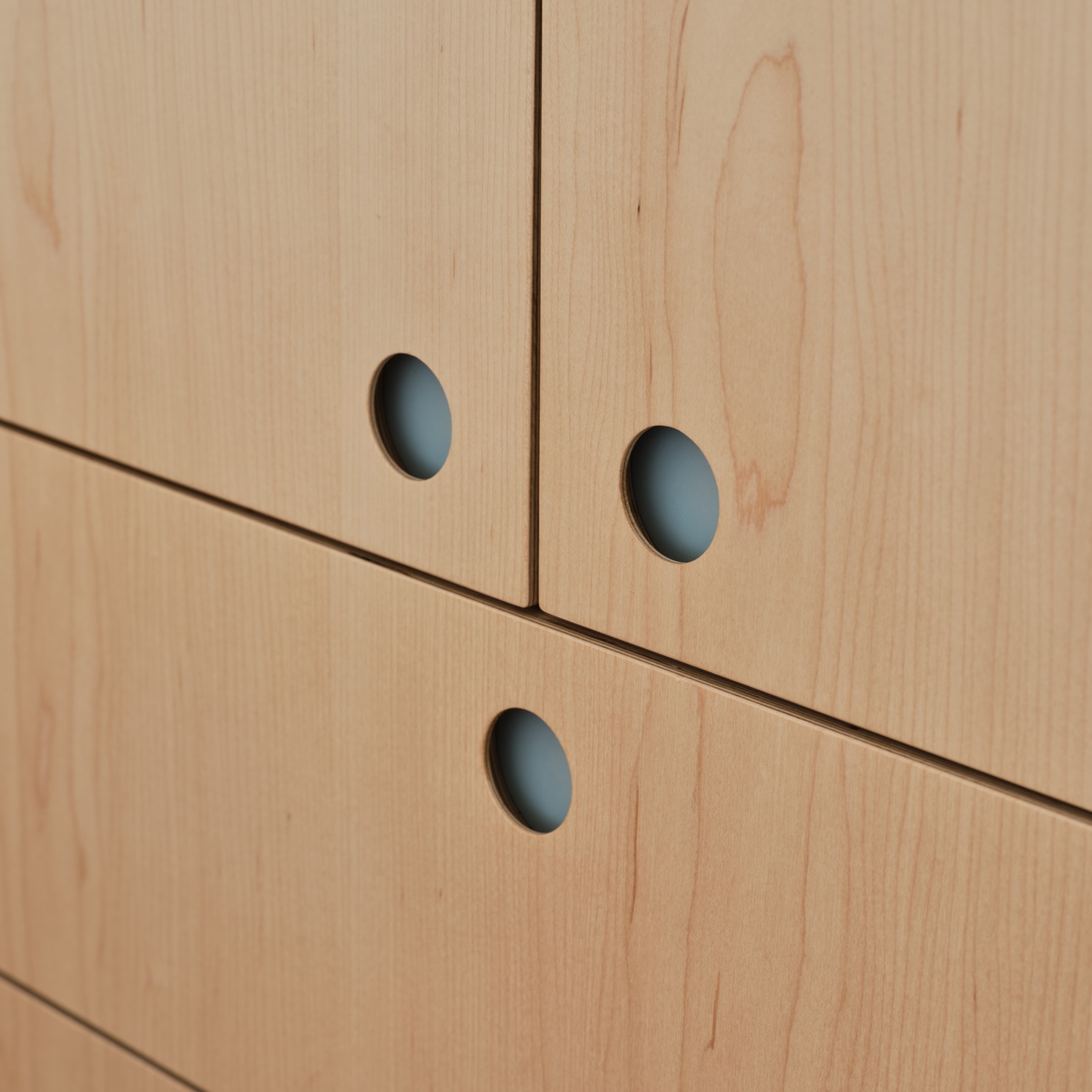 Plykea maple-veneered birch plywood with 35mm circle handles + Formica Dusty Jade inserts