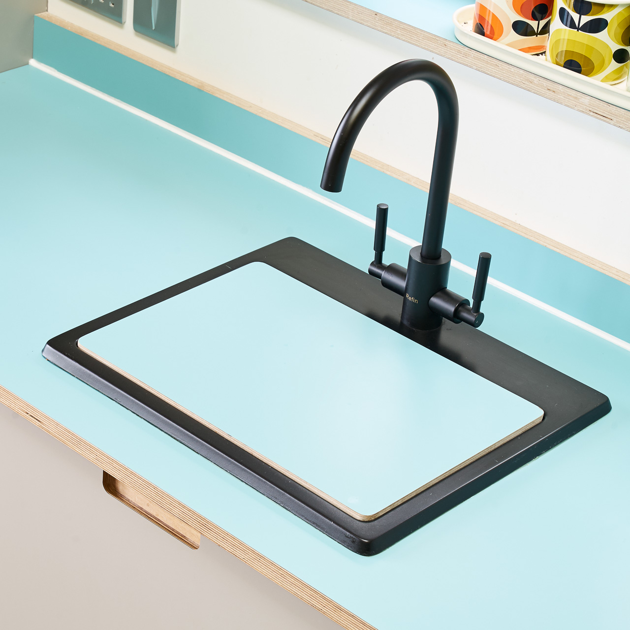 Fog and Chrome Yellow Formica fronts with semi-recessed handles in our Orchard Way kitchen