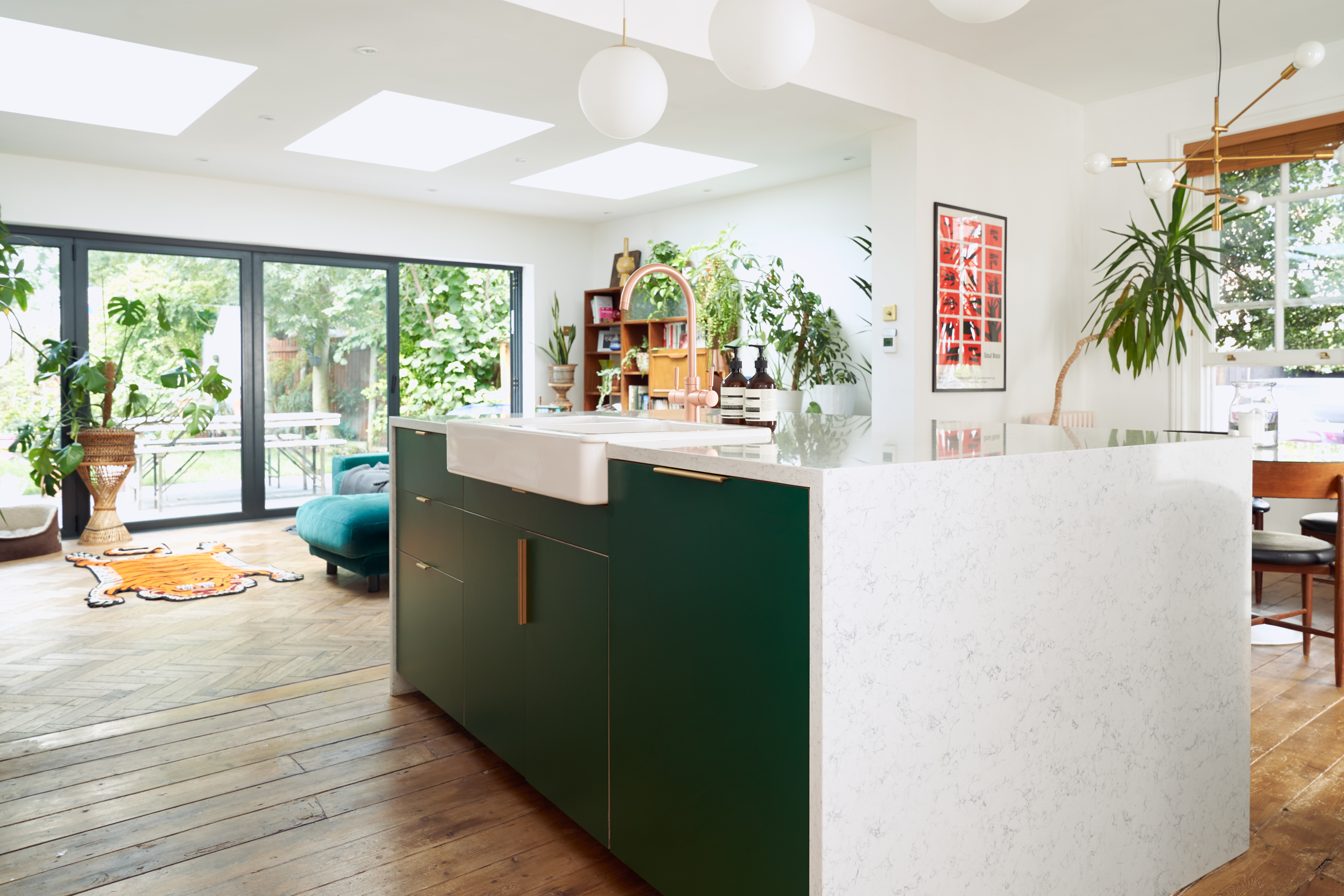 Hunter Green Formica, Walnut ply and brass edge pulls in our Forest Drive kitchen