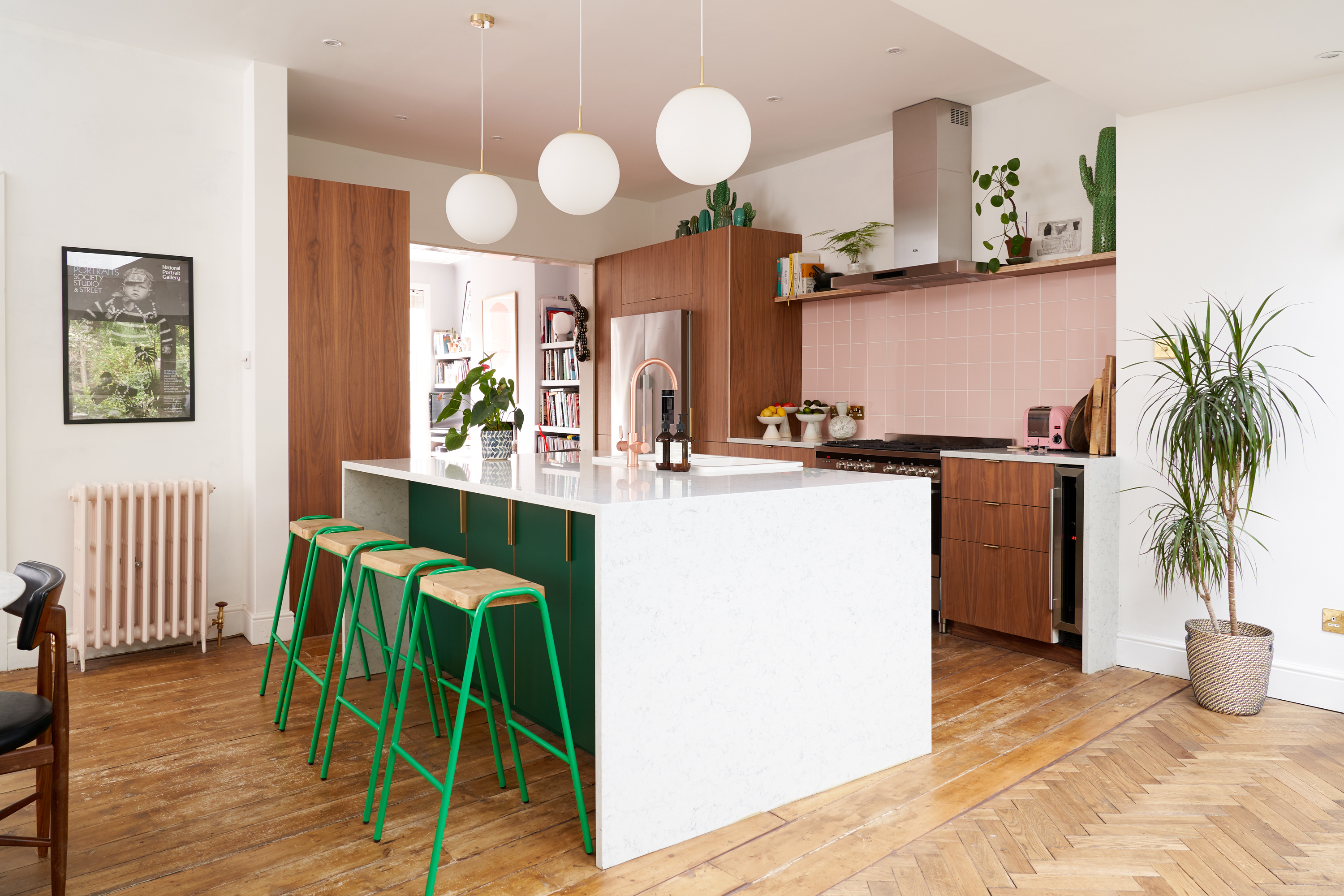 Hunter Green Formica and brass edge pulls in our Forest Drive kitchen