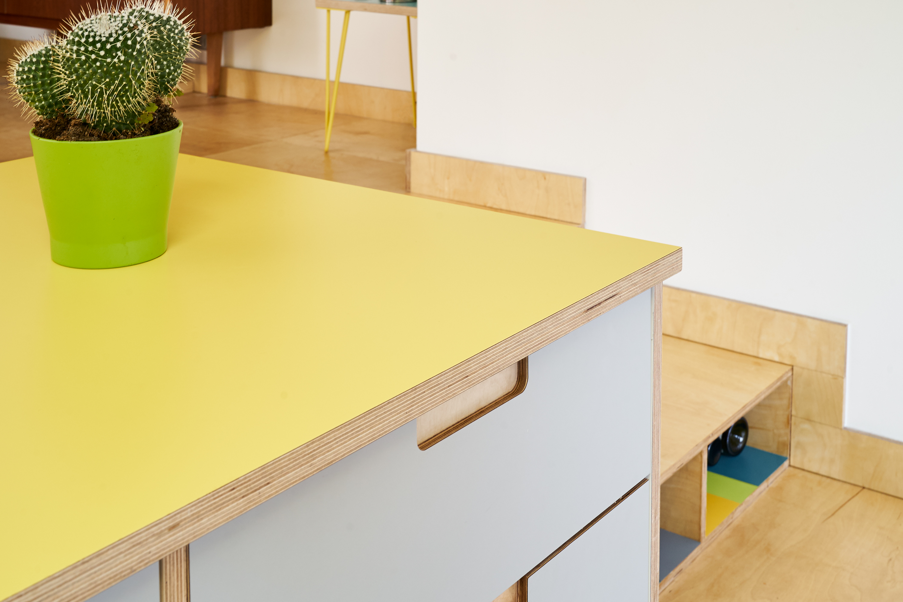 Fog and Chrome Yellow Formica fronts with semi-recessed handles in our Orchard Way kitchen