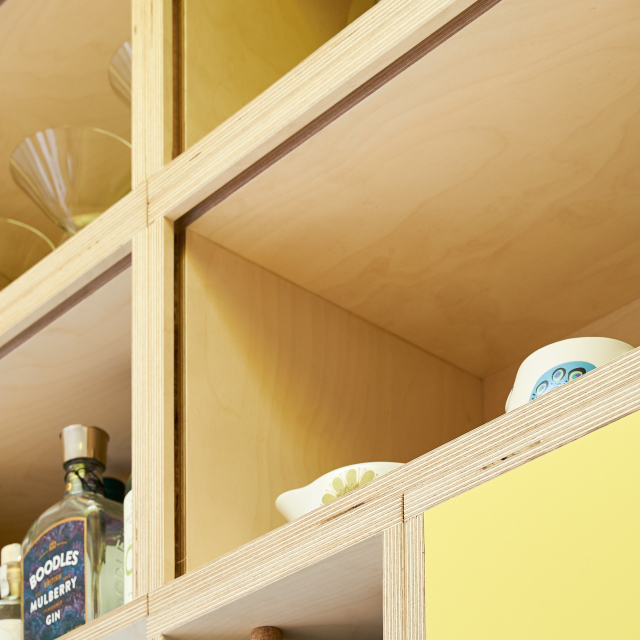 Fog and Chrome Yellow Formica fronts with semi-recessed handles in our Orchard Way kitchen