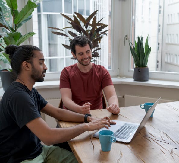 Two people working together