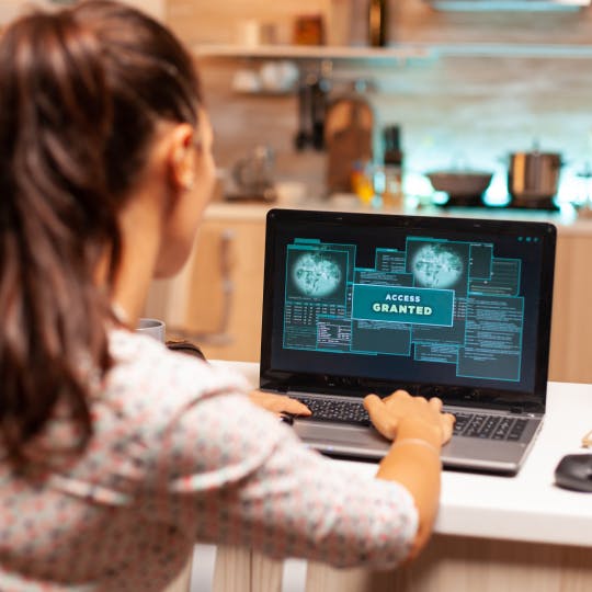 A woman working on her computer