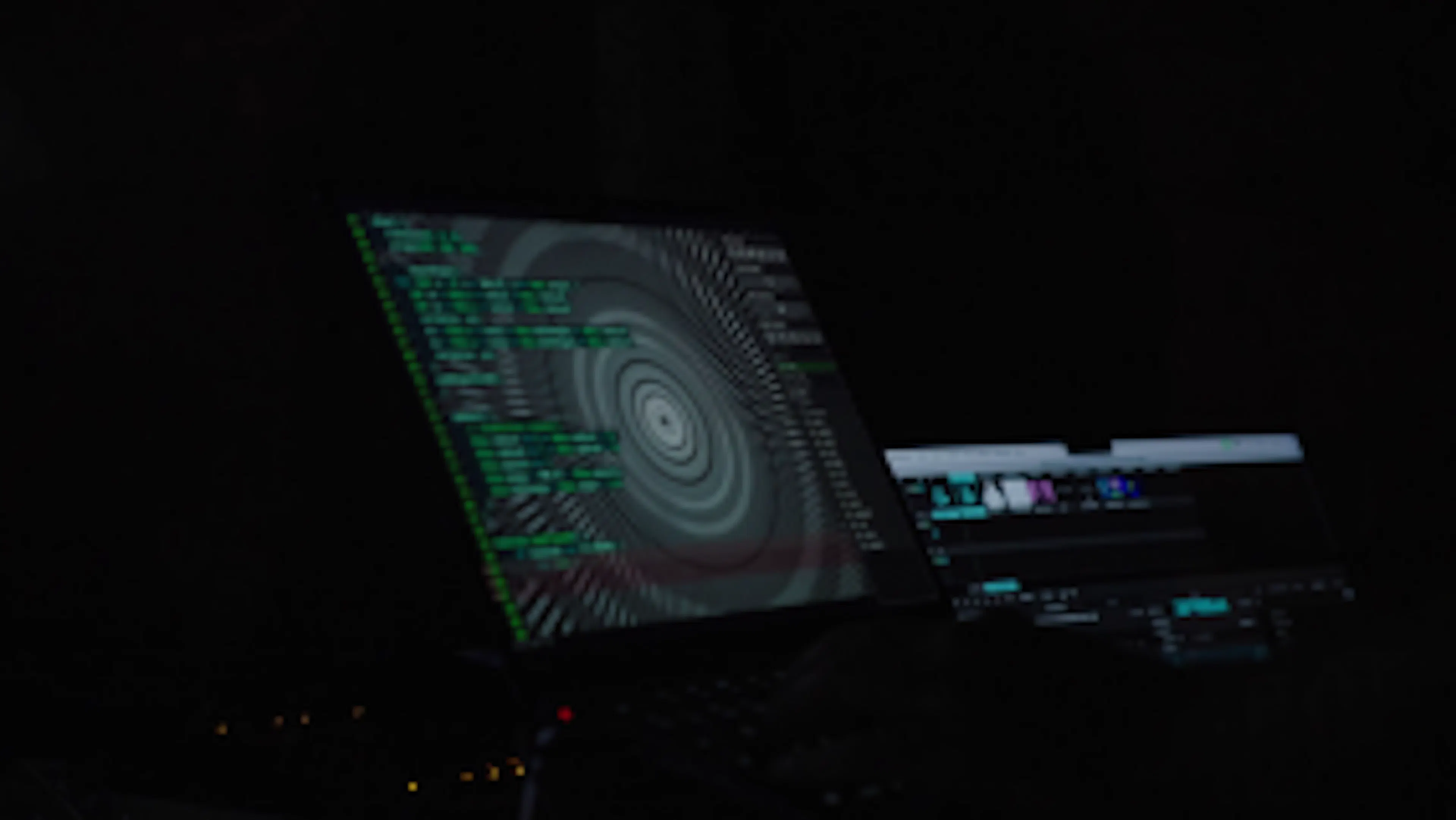 p5.js code on a laptop in the dark. 