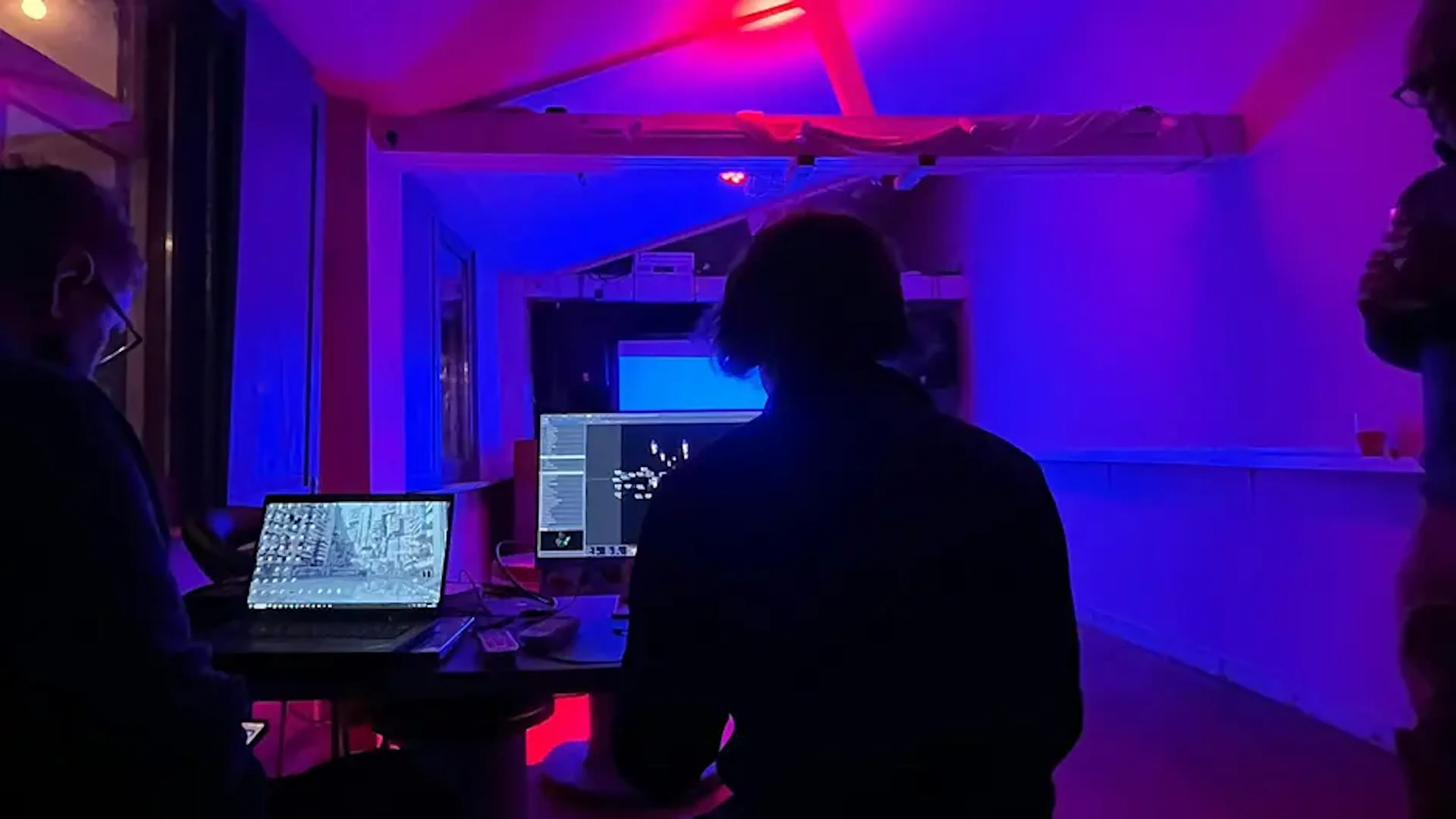 Felix Colbert setting up the work he's going to show at the audio visual meet-up.